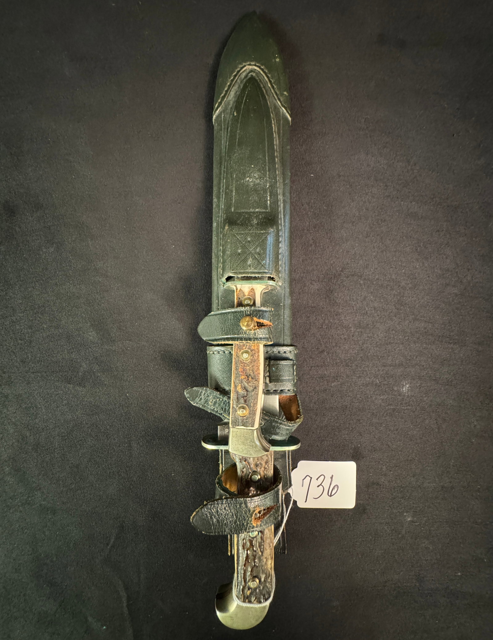 Puma Bowie & Side Knife: Puma bowie & side knife in a leather sheaf, made by Puma-Waidblatt, with antler handles, in as found condition. Measures 15.5"l in sheaf.
