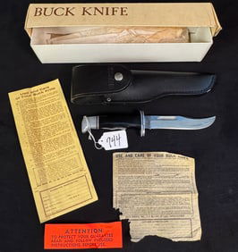 Buck Knife in Leather Sheaf
