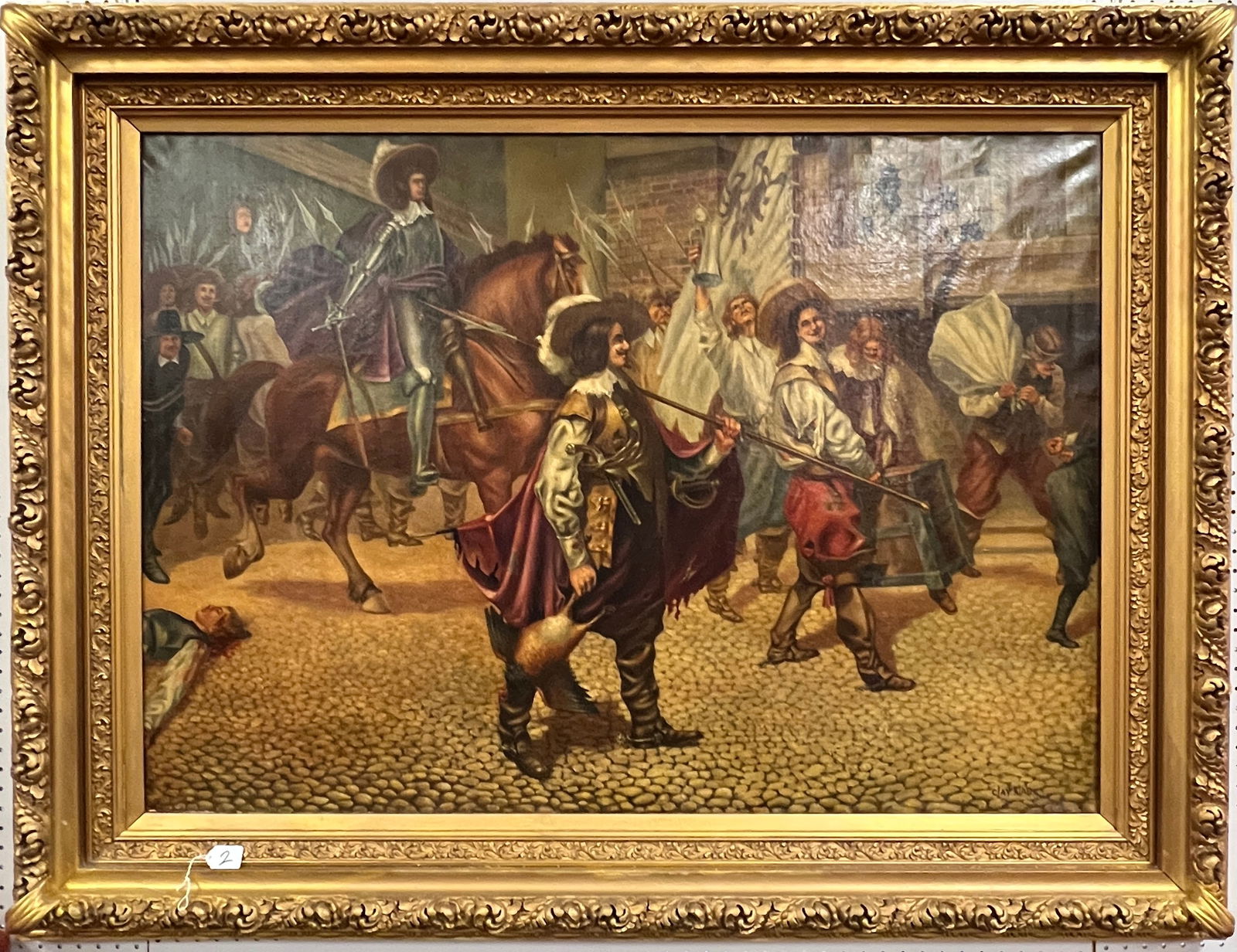 19th Century Oil on Canvas Signed Clay Klad, of Important Size: This late 19th Century oil on canvas is signed Clay Klad and appears to be in its original ornate gilded frame. This depicts a victory parade of 16th century soldiers marching through an old world cit