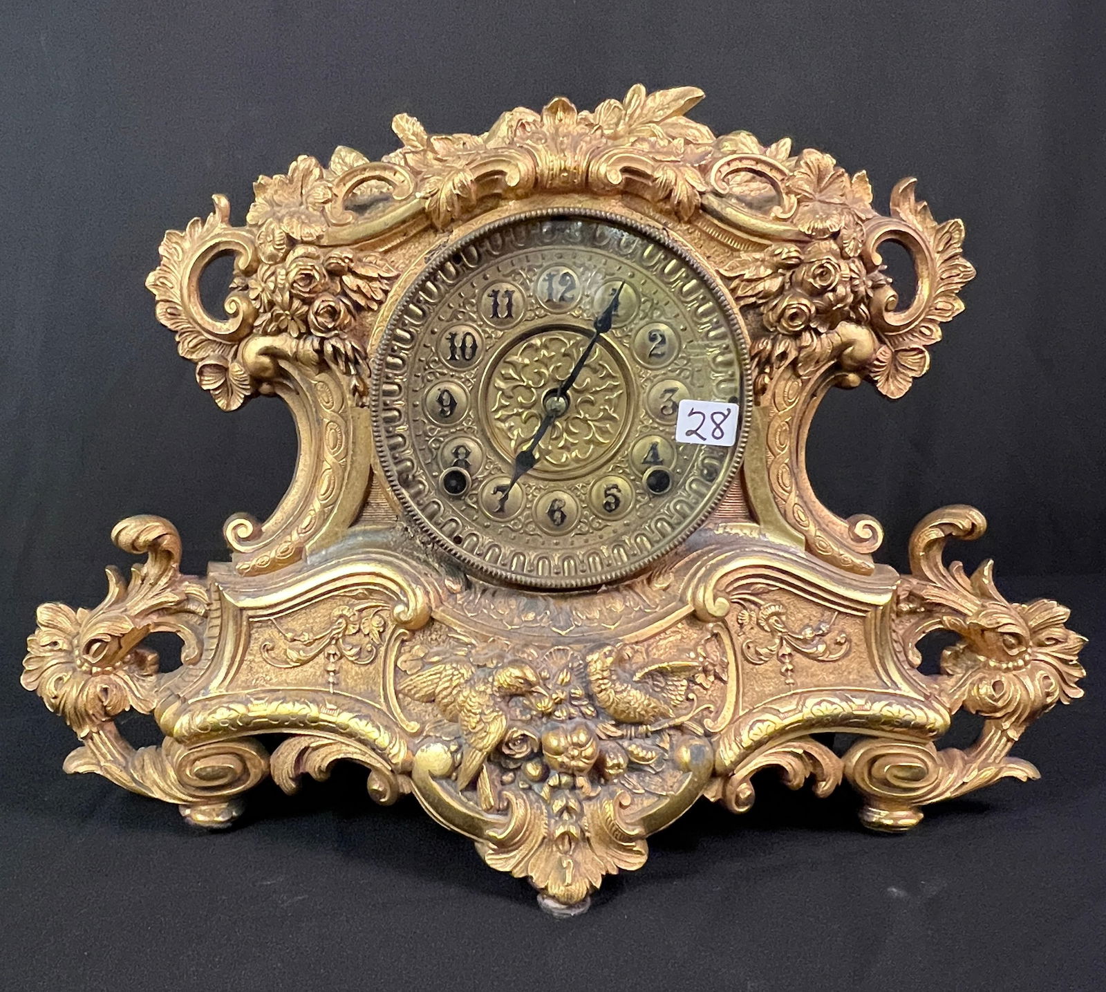 Mueller Gilded Bronze Mantle Clock C1850's: A fancy gilded bronze elaborately chased and filigree mantle clock c.1850's in good condition. It features birds and flowers. In good condition.