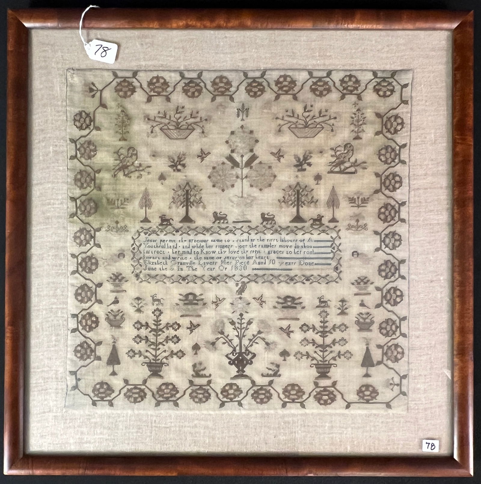 Child's Sampler c1830 By Elizabeth Granville Laverr Age 10: A quality framed elaborately, cross stitched child's sampler c1830 in excellent condition by Elizabeth Granville Laverr, age 10. It features a floral and vine border, potted trees, lions, deer, birds,