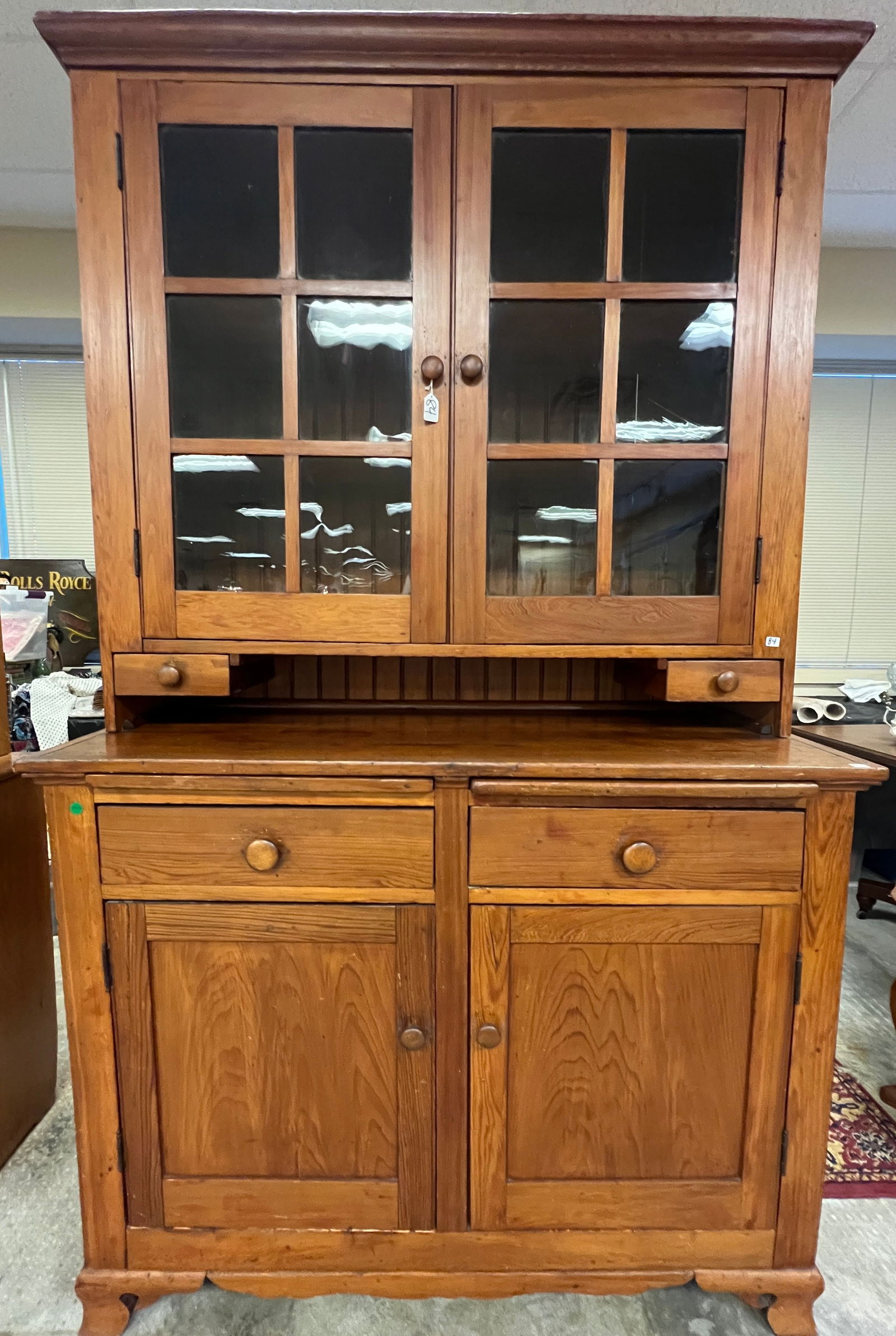 Federal Country Pine Step Back Cupboard c1820/30's: An antique Federal country pine step back cupboard with spoon drawers, double glass doors, double door and drawer bottom, side by side cutting boards, original glass, original feet in very good condit