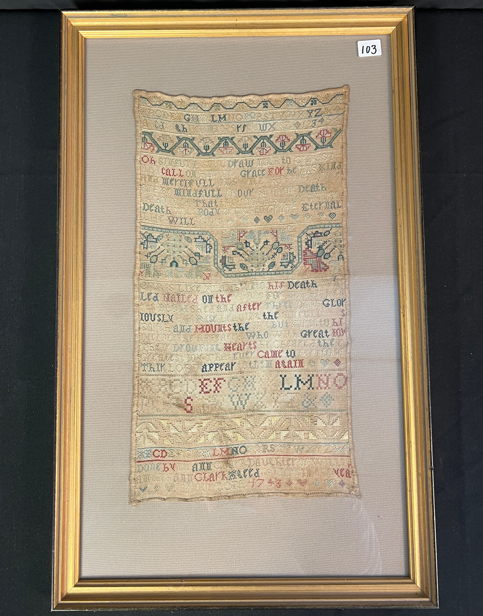 Sampler by Ann Clark c1743: A sampler by Ann Clark, American, c1743, with small case alphabet, an upper case alphabet, two prayers with elaborate borders and more. It retains great color and is in wonderful condition considering