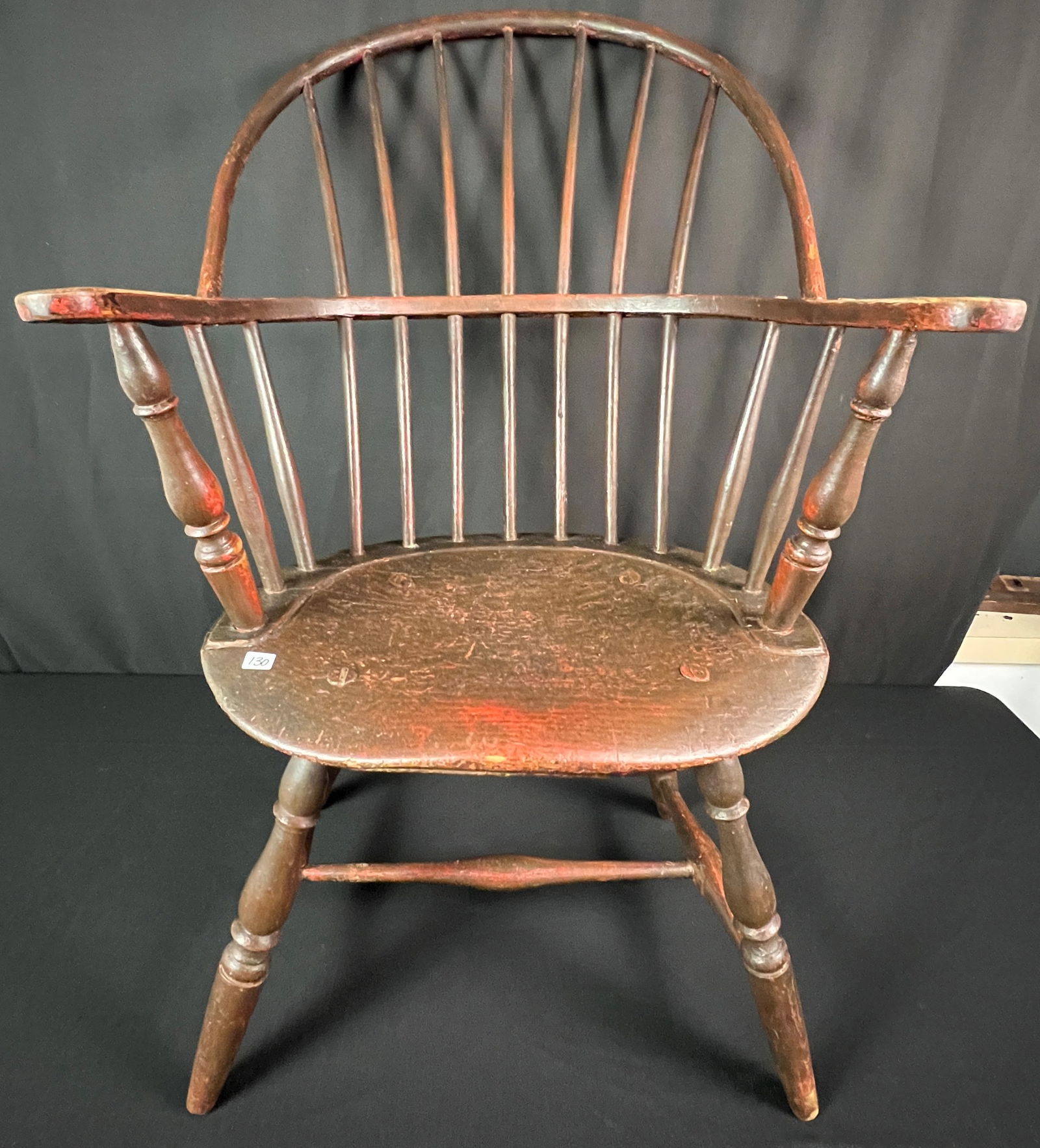 Antique Sack Back Windsor Armchair, Orig Red paint C 1780/90: An American antique Sack back Windsor arm chair c1780/90's that features original red paint, saddle seat, turned legs and stretcher in original condition and finish! It measures 37" tall X 22" across