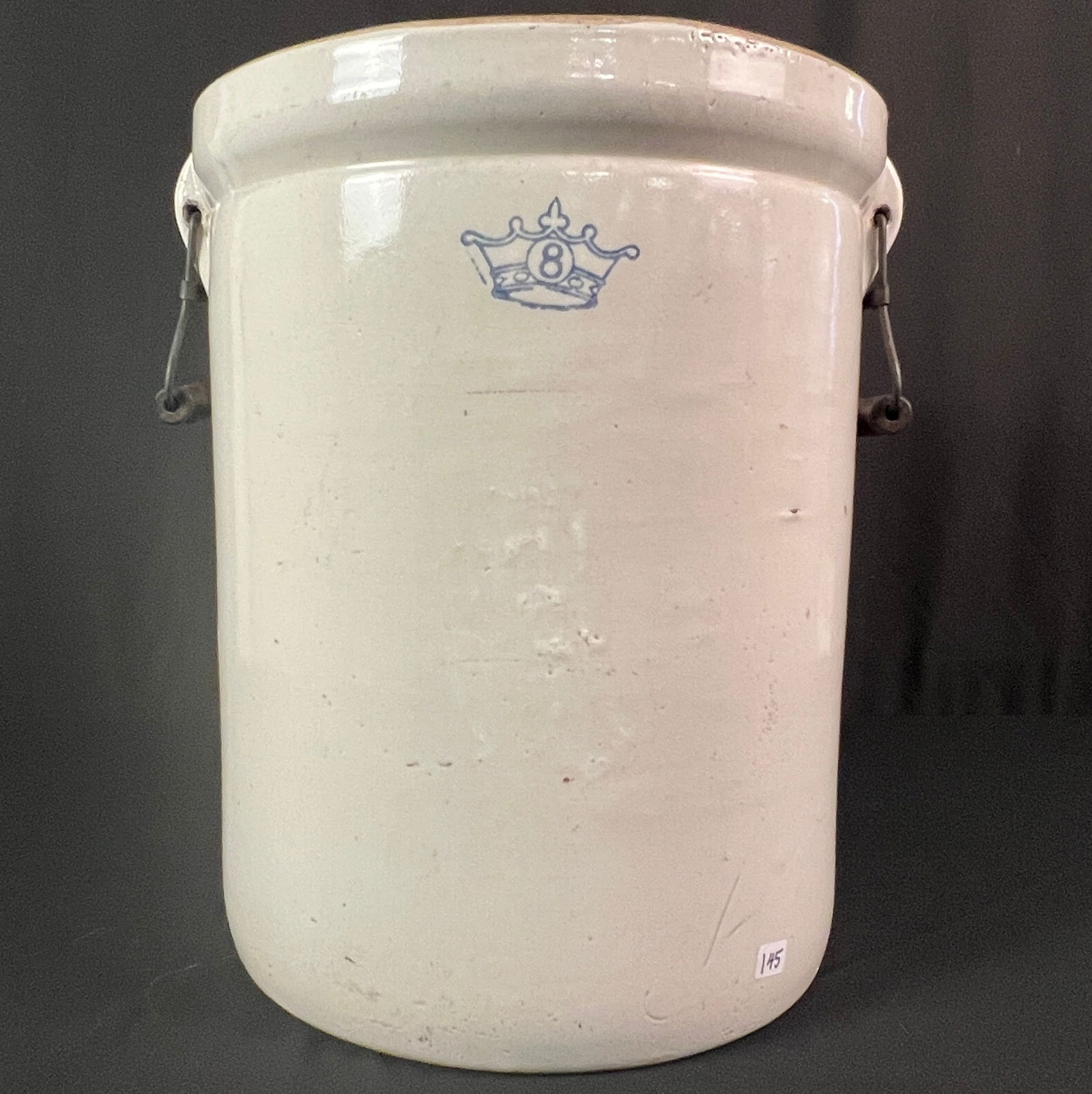 Antique Robinson Ransbottom 8 Gallon Stoneware Crock, Late 1800s: An antique Robinson Ransbottom 8 gallon stoneware crock featuring the blue crown mark bail handles, with turned wood grips. In excellent, remarkable condition, it measures 17" tall X 15" across.