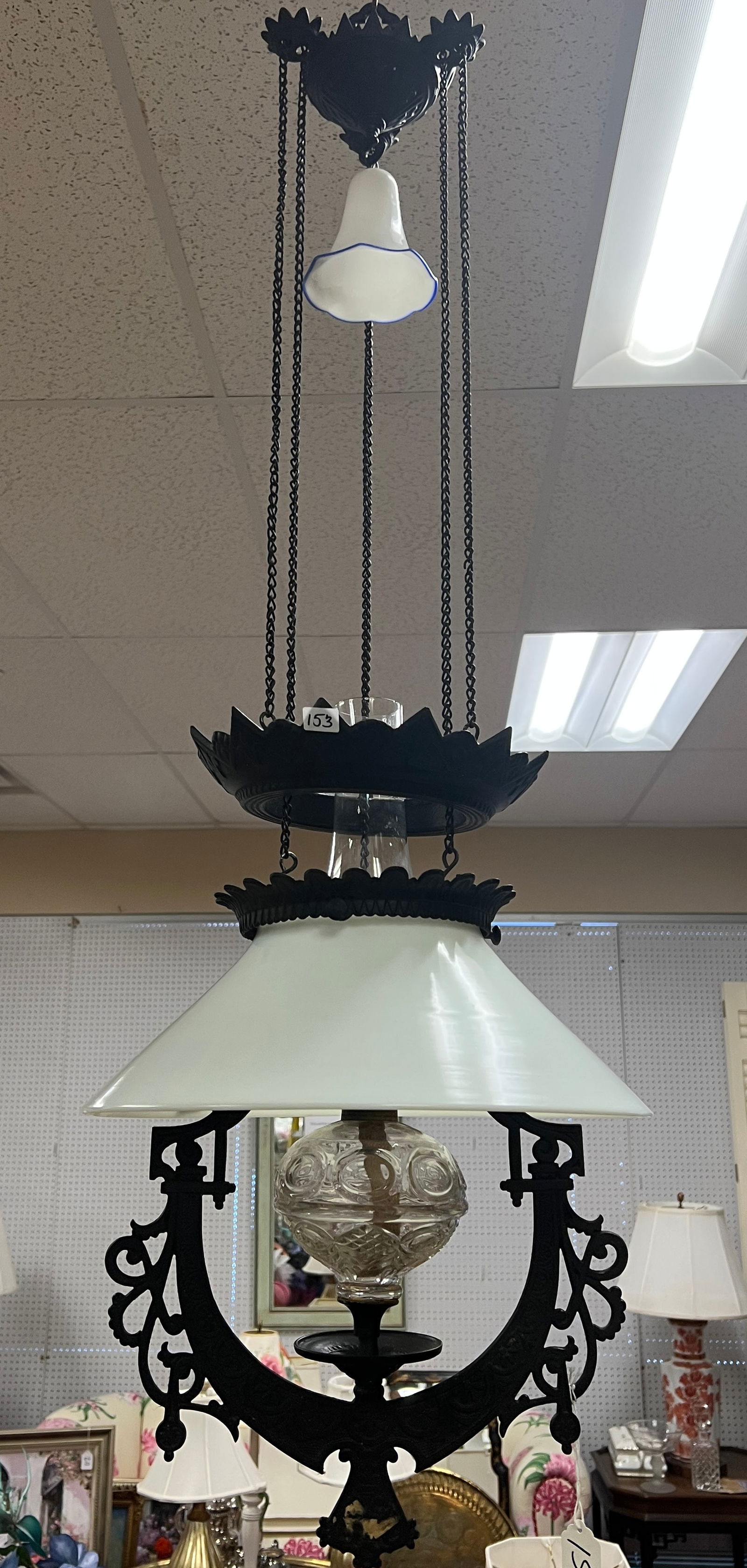 Hanging Cast Iron Kerosene Lantern c1800's: A cast iron, height adjustable hanging kerosene lantern, with milk glass shade and smoke shield. This piece is in excellent condition.