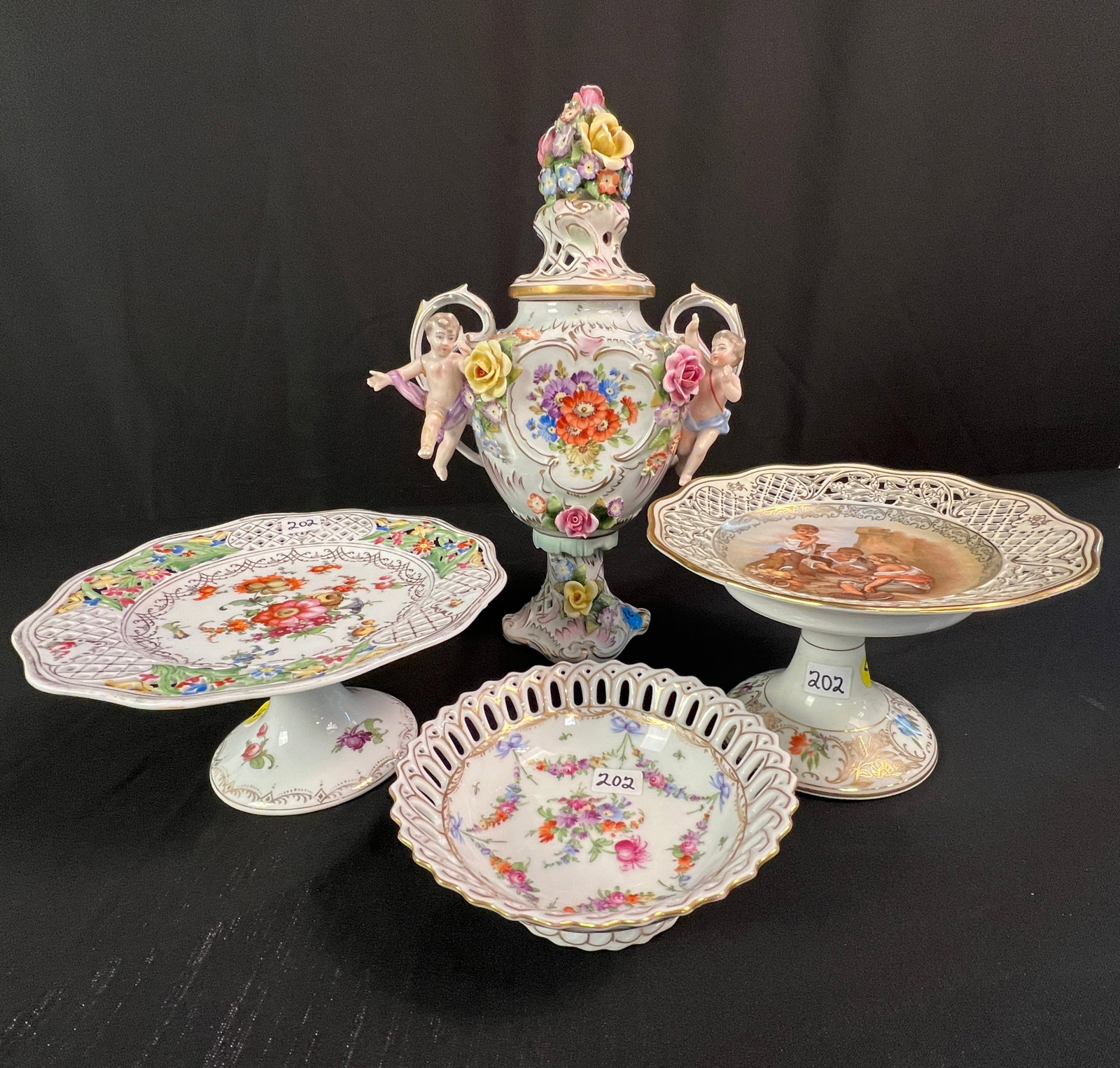 Antique German Porcelain, Urn, Footed Plates, Dresden, Schumann, More!: A group of German fine porcelain early 1900's to include a Dresden floral hand painted reticulated footed bowl in excellent condition. (2" tall X 6" across), A hand painted 13" tall Von Schierholtz