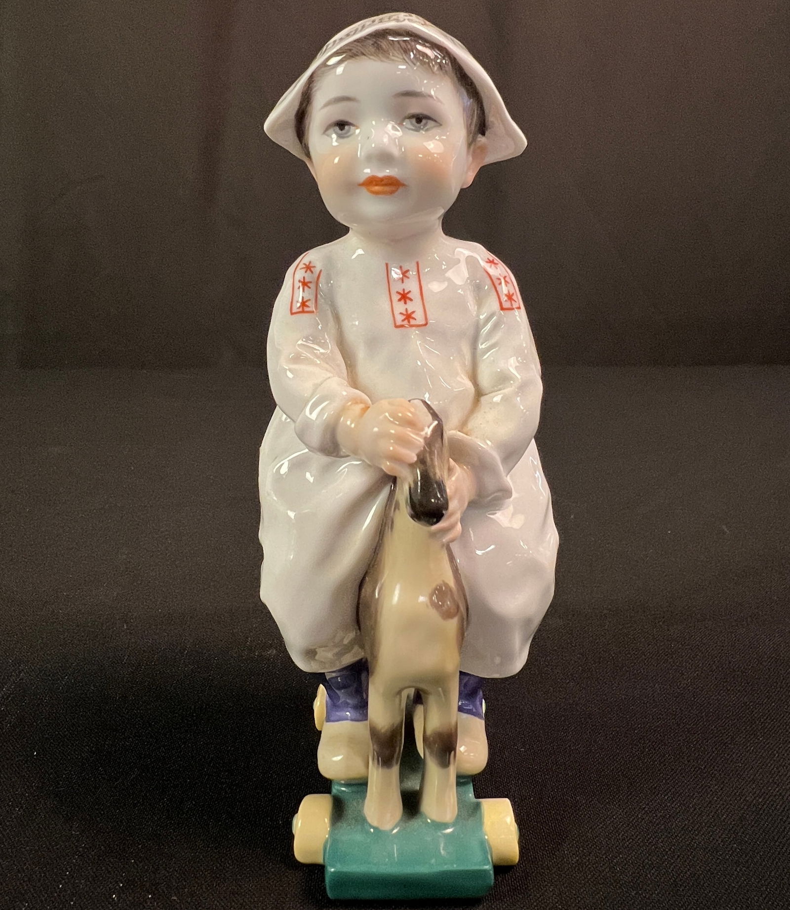 Meissen Porcelain Boy Figurine "Hentschel Children" series C1904-1907 by Jules Konrad Hentschel: An Art Nouveau Meissen Porcelain "Hentschel Children" series C1904-1907 designed by Jules Konrad Hentschel (1872-1907) in excellent condition with the Meissen marks depicting a little boy in a paper h