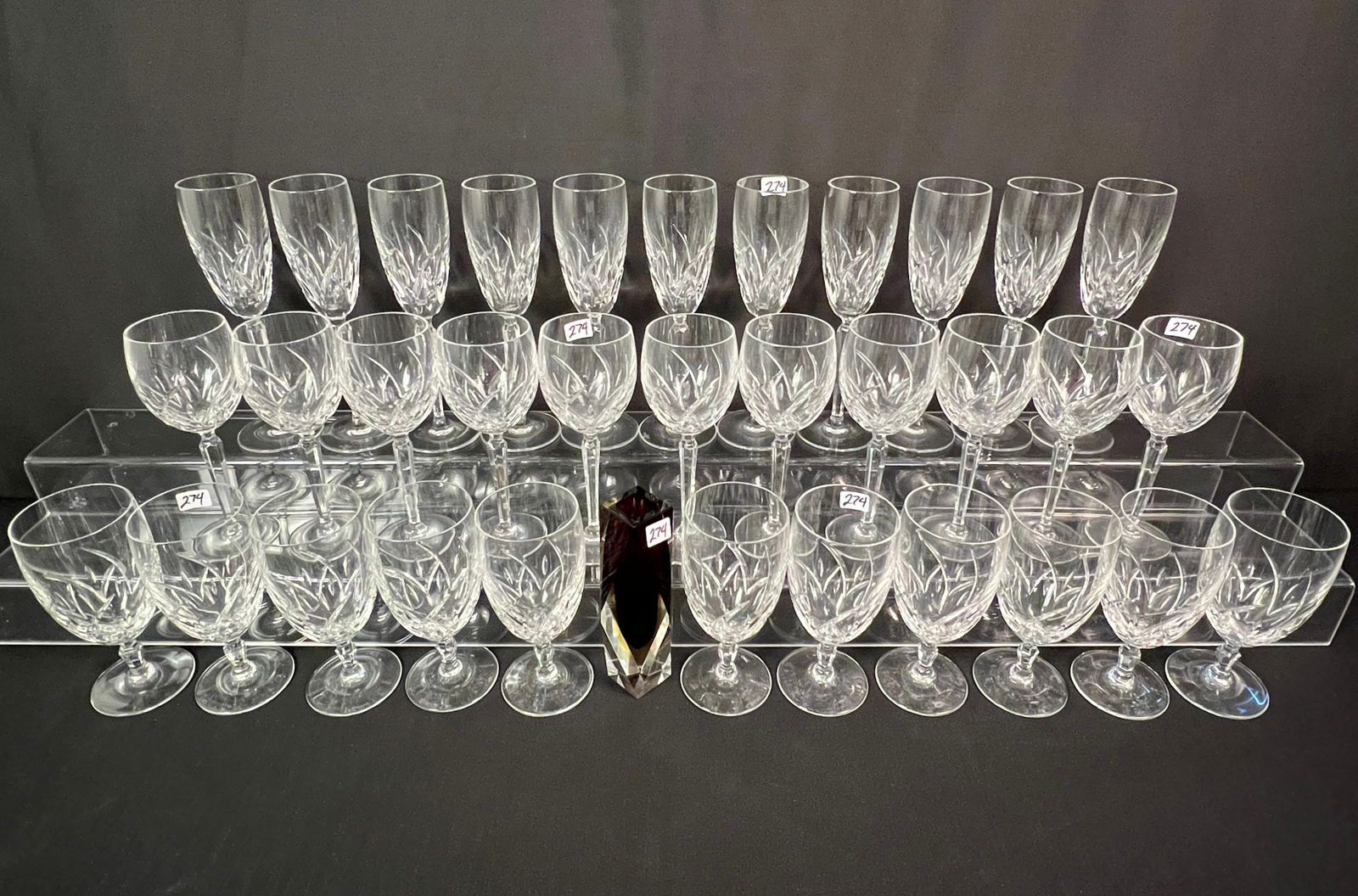 Group of Waterford "Lucerne" Glassware & Murano Glass Vase: A group of Lismore Waterford glassware to include 11 wine glasses and 11 water goblets and 11 champagne flutes. Also included is a Murano crystal vase measuring 6.75" tall.