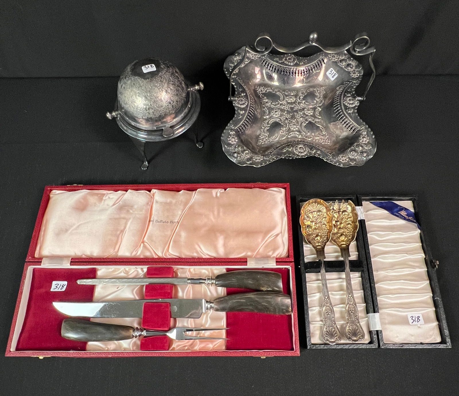 Victorian Silverplate Bride's Bowl, 2 Silverplate Serving Pieces and More: A Victorian silverplate bride's basket with pierced decoration and floral motifs. It measures 5.75" tall X 6" across. Also included is a 2 piece Sheffield silverplate salad set in box, a Victorian