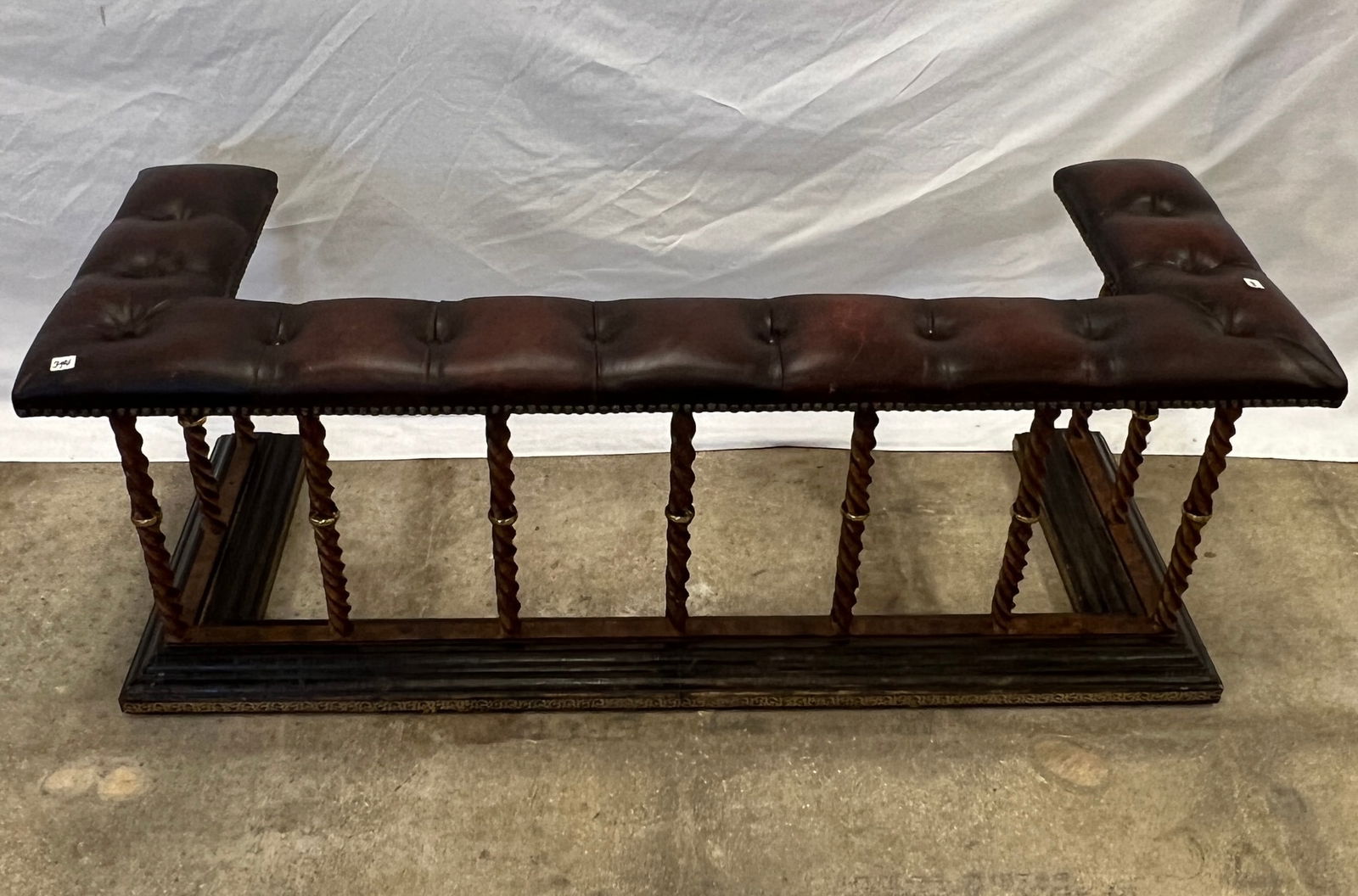 1890s/1900 Fireplace Bench: A burled walnut, barley twist bronze and button tufted brown leather fireplace bench. Made around the turn of the century. House ready in excellent condition, it measures 17" tall X 50" long X 18.5"