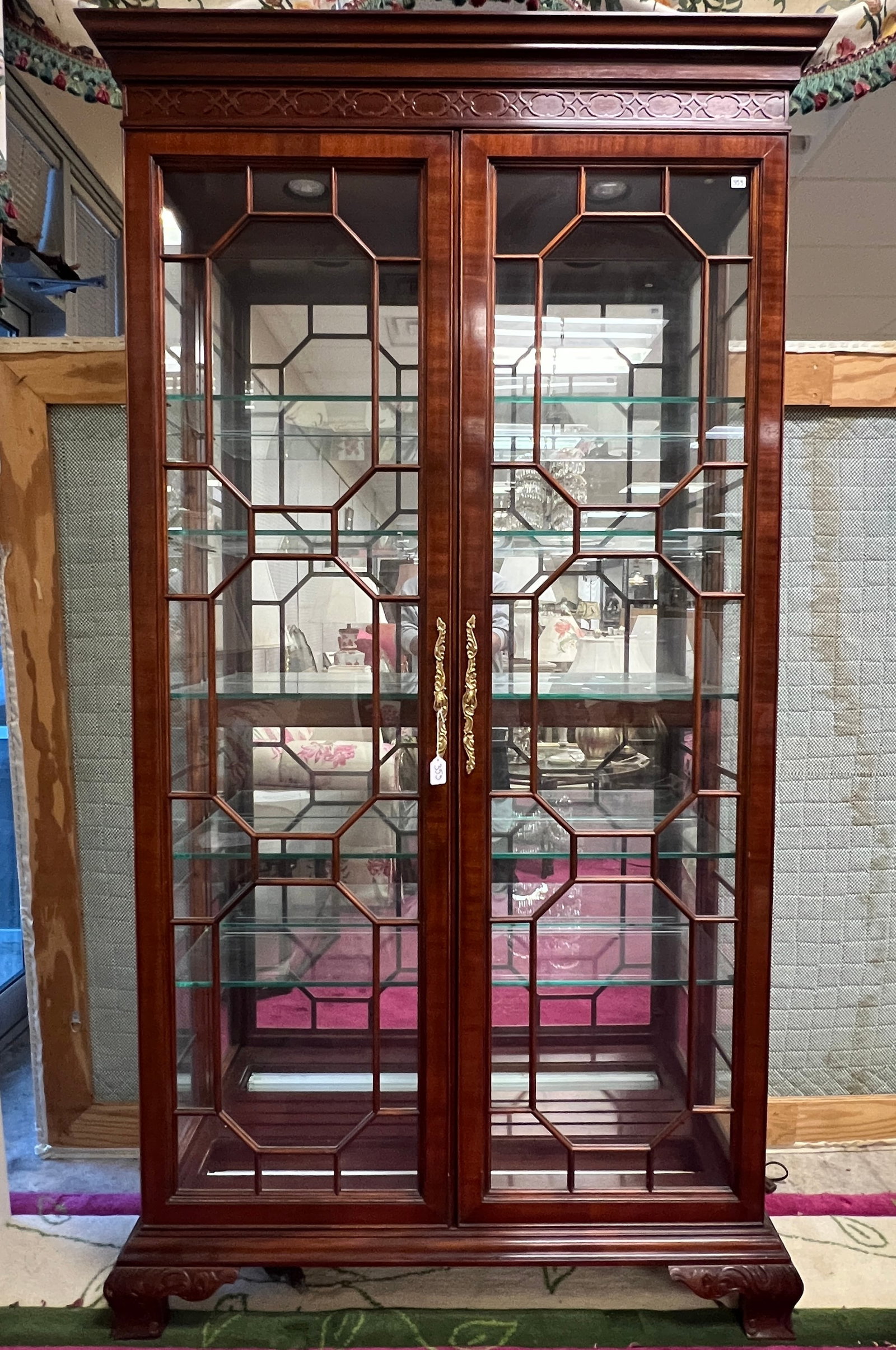 Councill China Cabinet: A stunning Councill Chinese Chippendale full length, mirrored back, electrified China cabinet. This double door China cabinet is in excellent condition and measures 82" tall X 41.25" across X 12.5" de