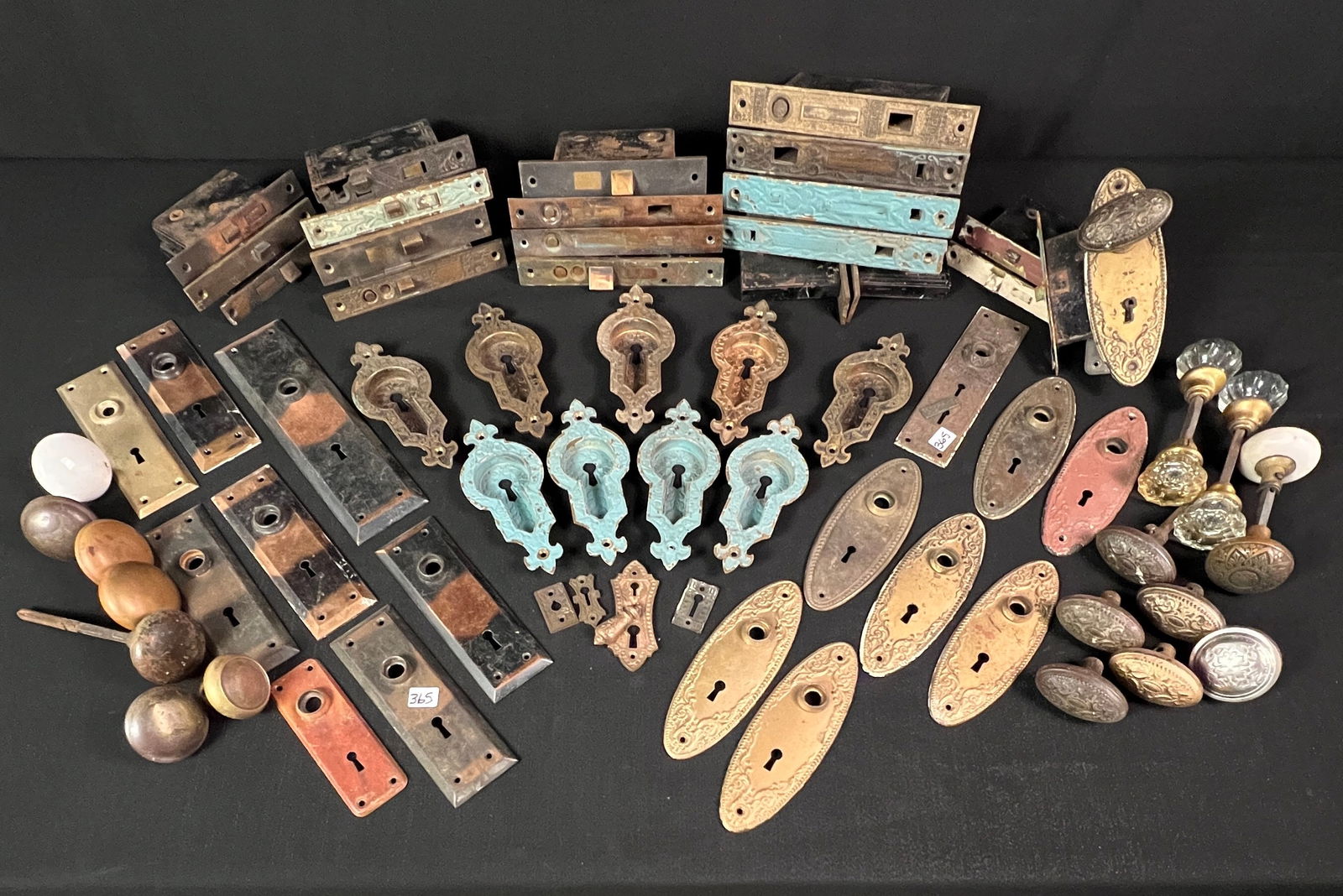 Group of Fancy Victorian Hardware: A group of fancy Victorian hardware to include locksets, door knobs, fancy key covers, and door plates. These items came from the G. Heileman Estate in La Crosse WI that came out of Duncan D.