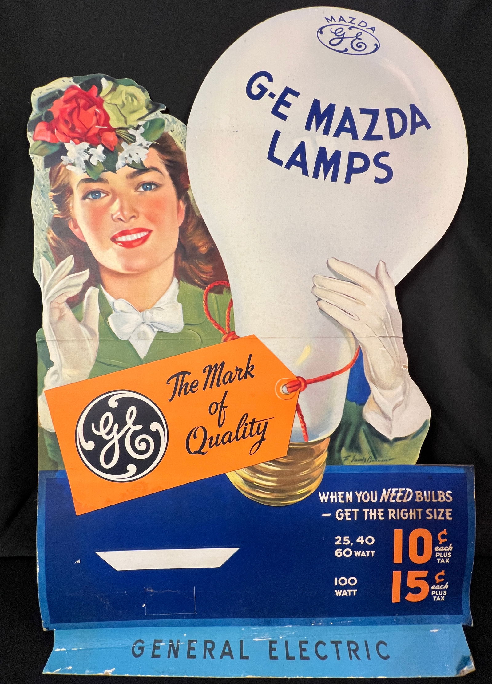 GE Mazda Lamps Advertisement c1930s/40s: A 1930s/40s GE cardboard store advertisement for light bulbs. In fair condition it measures 33" tall X 22" across.