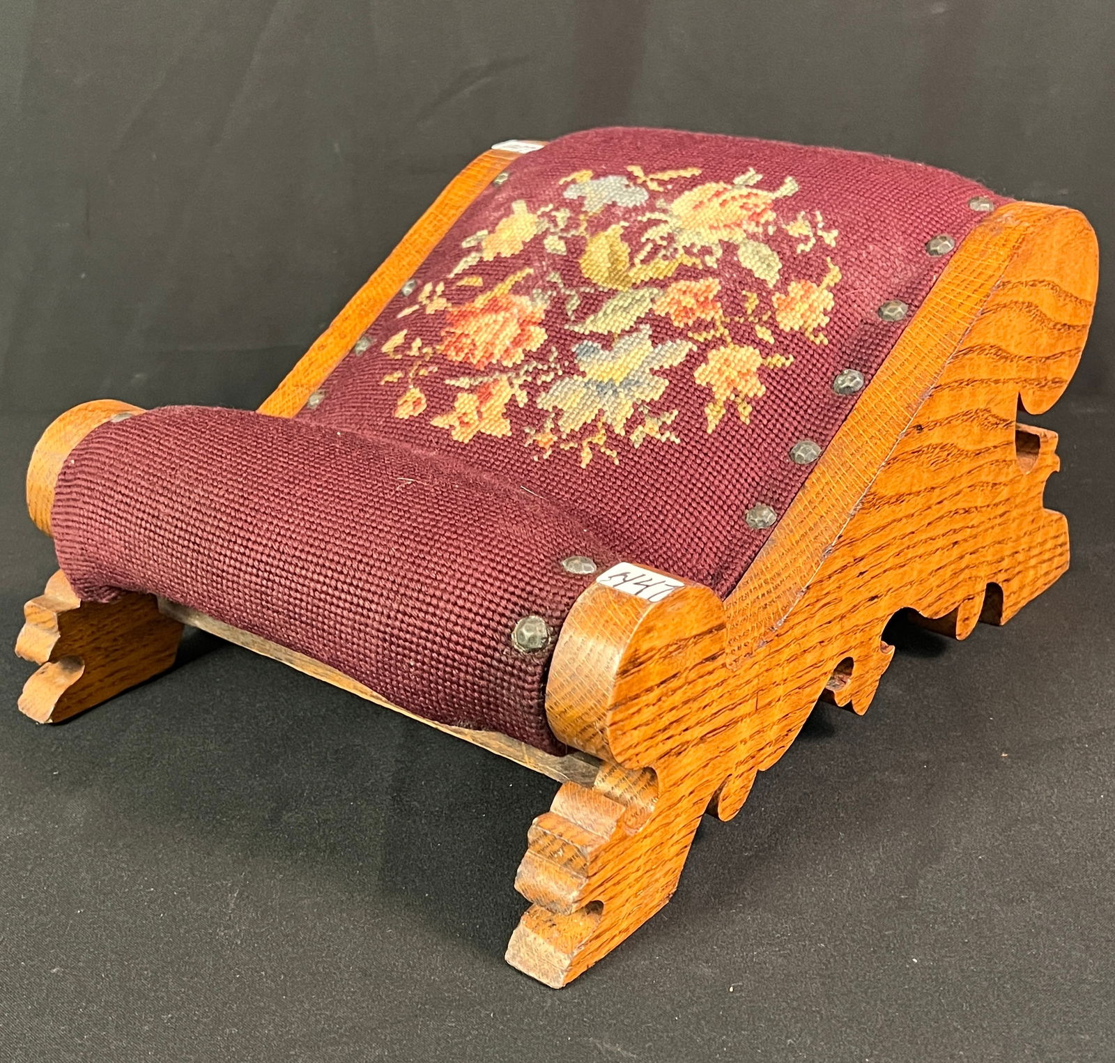 Oak Floral Needlepoint Foot Stool: A quality Victorian fancy oak, floral needlepoint foot stool. In good, house ready condition.