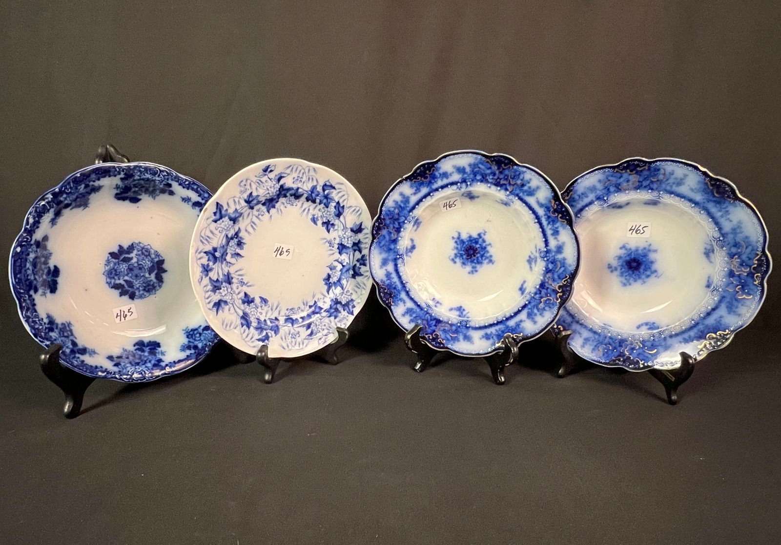 3 Flow Blue Bowls and 1 Flow Blue Plate: A group of Flow Blue to include 3 bowls and 1 plate. The pieces are different designs and in good condition. One bowl has a chip and short crack.