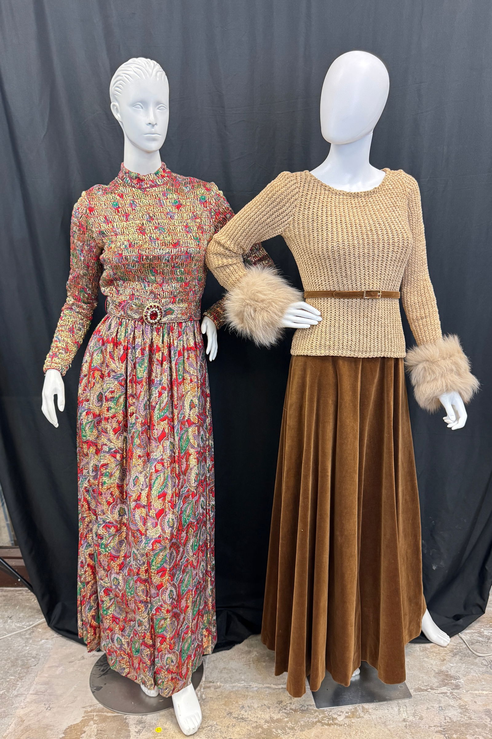 Two Vintage Floor Length Evening Gowns c1960's: Two late 1960's full length evening gowns to include a Marshal Field and Company paisley print evening gown with gold lame threading, rouched top and matching belt with rhinestone and ruby boucle in e