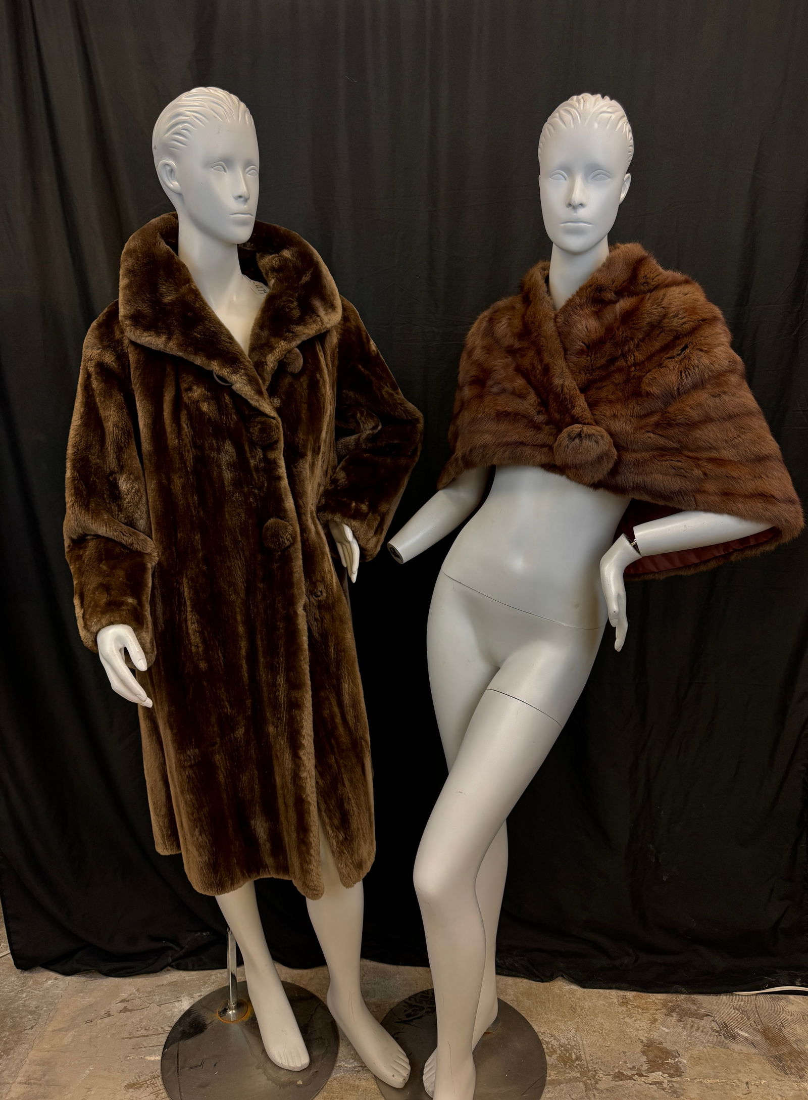 Vintage Beaver Fur Coat and Fur Stole: Two vintage fur pieces to include a 1950's ladies full length beaver coat with 3/4 sleeves, and a 1950's brown fur stole with iridescent lining in good condition. Beaver coat measures 21" across the
