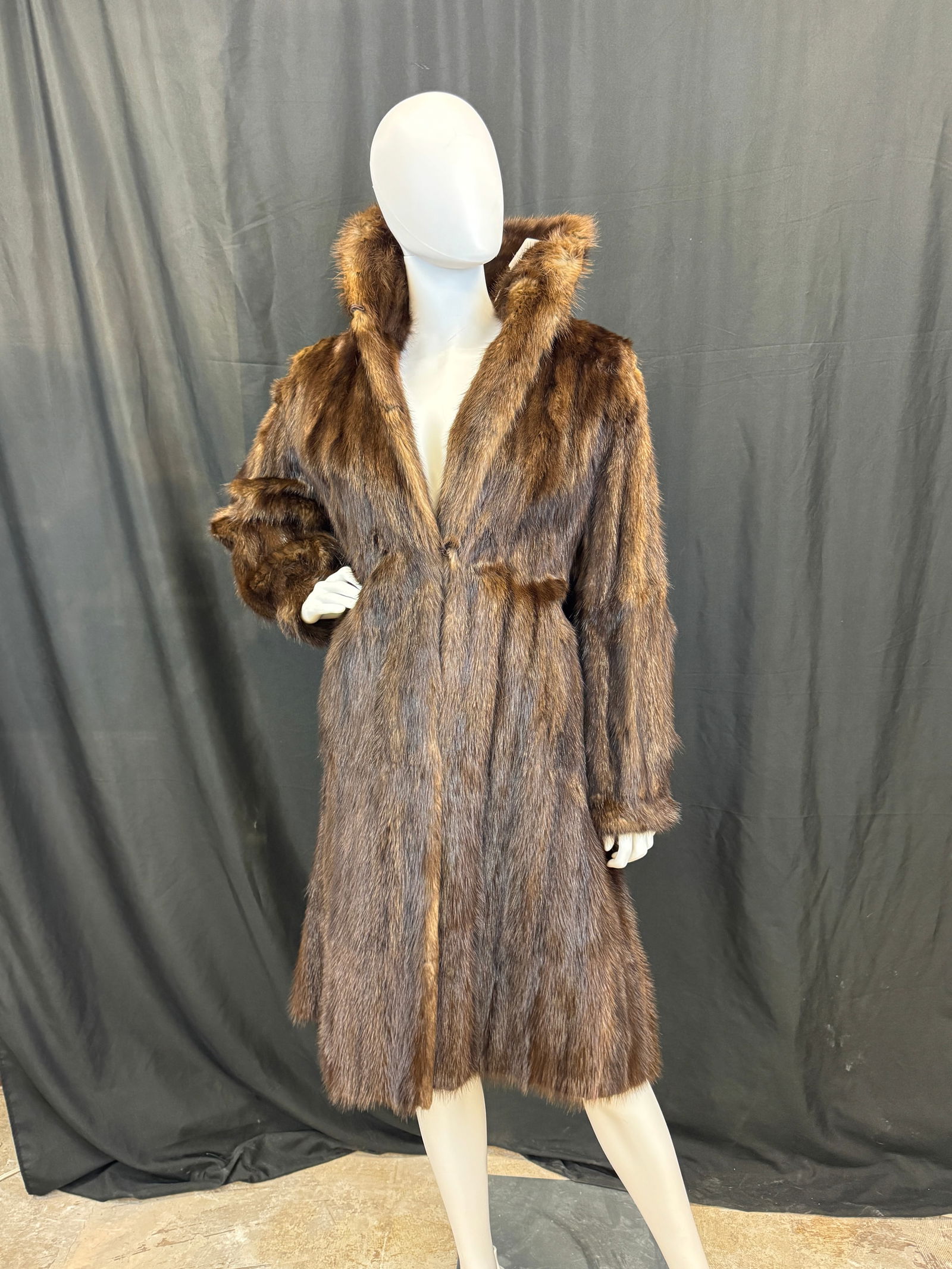 VIntage Full Length Mink Coat c1960's: A vintage brown mink fur coat by Furs by Truesdell that features side pocket and hook front closure in good condition, professionally stored.