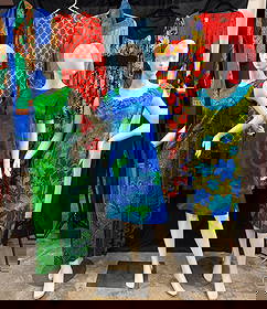 8 Vintage Print Ladies Dresses c1960/70's: A group of 8 vintage ladies dresses from the 1950's and 60's to include 3 Hawaiian print sleeveless dresses (a Polynesian Casuals for Norma Mairs, Ja-Na of Hawaii, and a Tanja Originals of Honolulu),