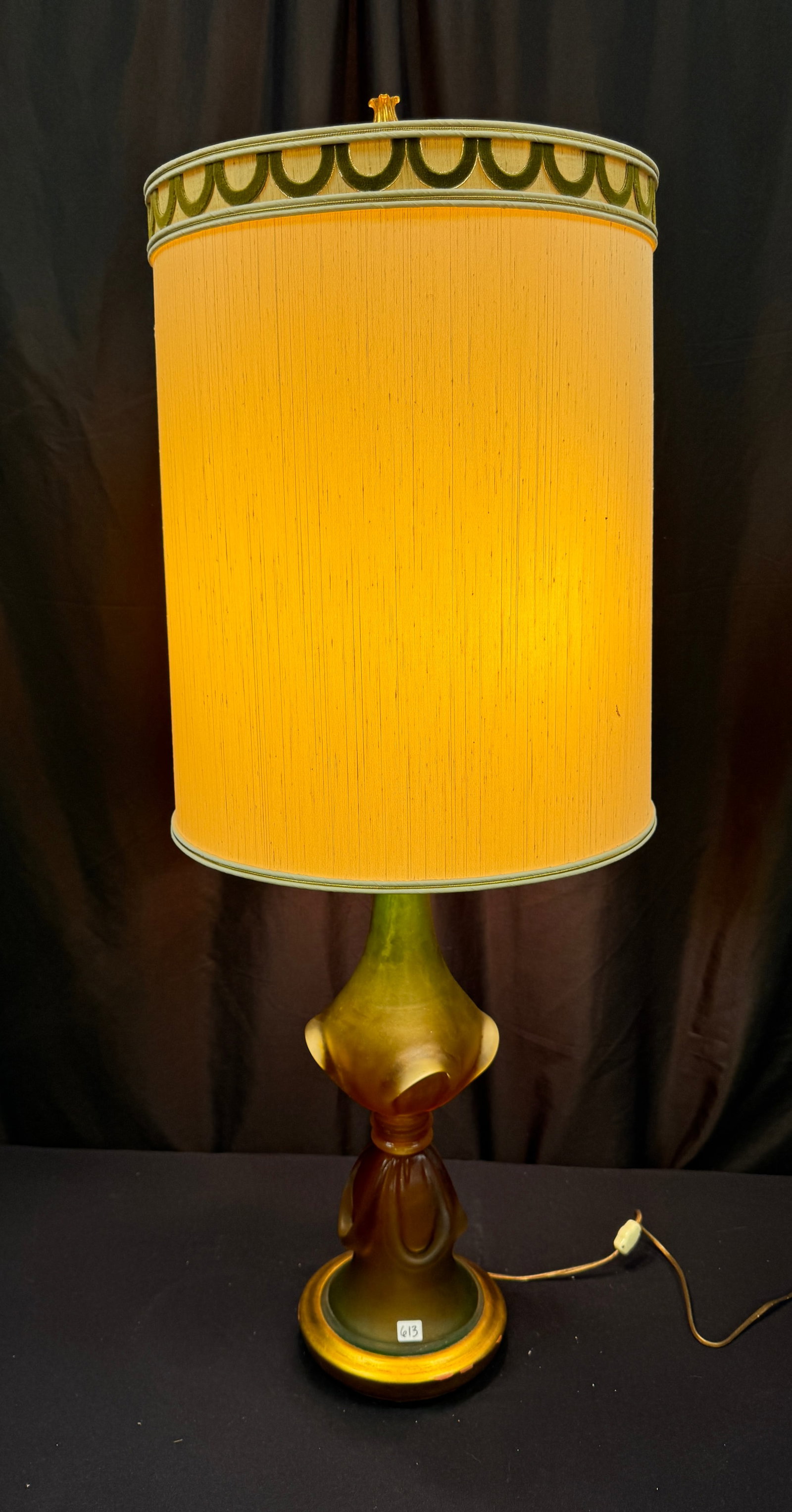 Seguso Murano Glass Mid Century Lamp by Marbro: A Seguso Murano glass lamp by Marbro. The lamp features a beautiful emerald ochre color with an acid etched satin finish. Lamp retains its original shade with green cut velvet accents at top. It