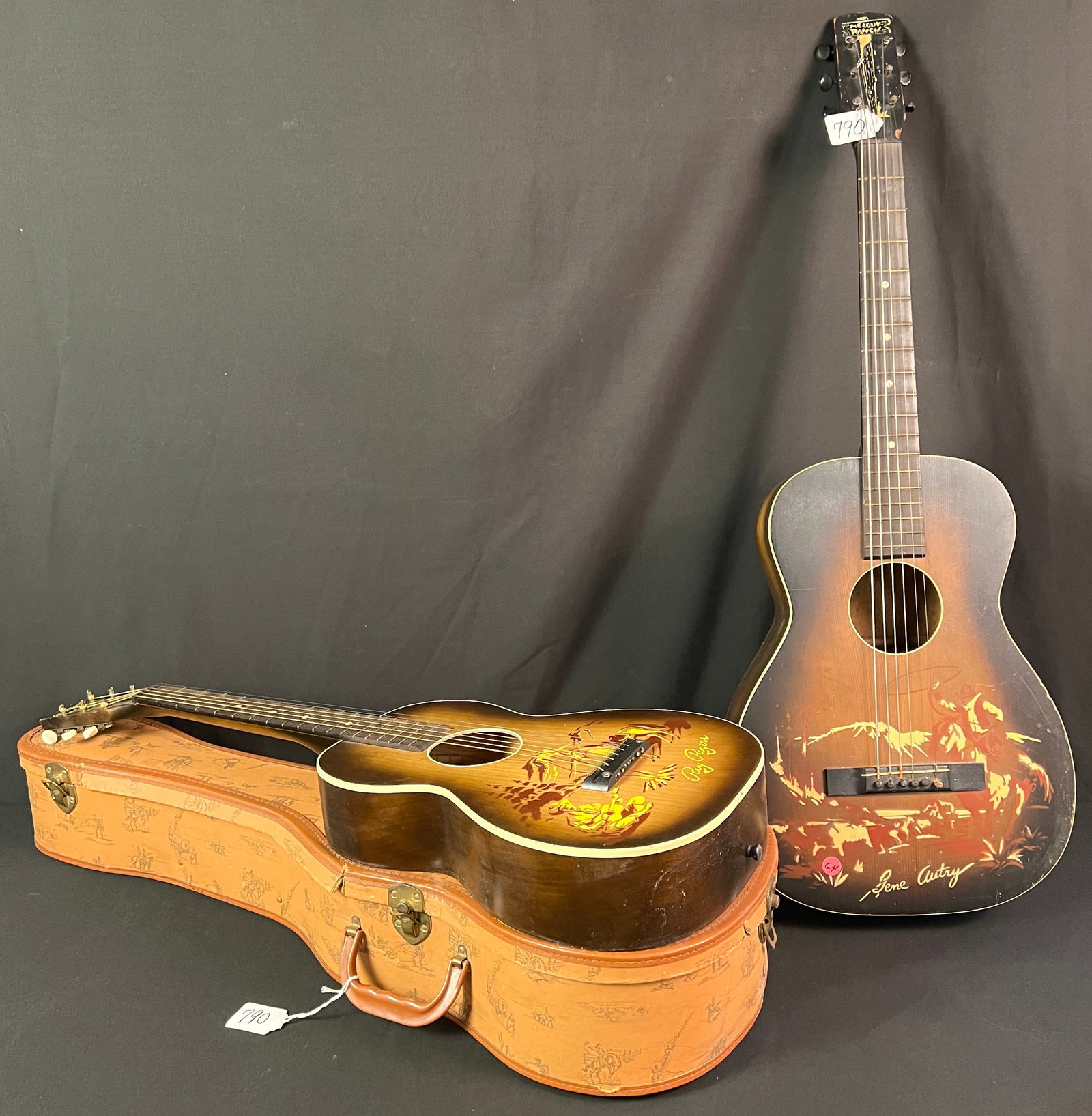 2 Gene Autry Guitars: 2 Gene Autry guitars. One in its original case in excellent mint condition, along with another one in fair condition.