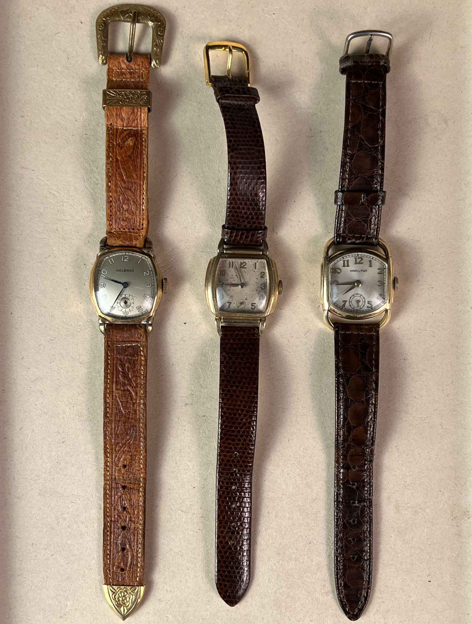 Group of 3 Gold Filled Mens Wrist Watches.: A group of 3 gold filled mens wrist watches, they are untested. Included are a Harper, Hamilton and Helbros.