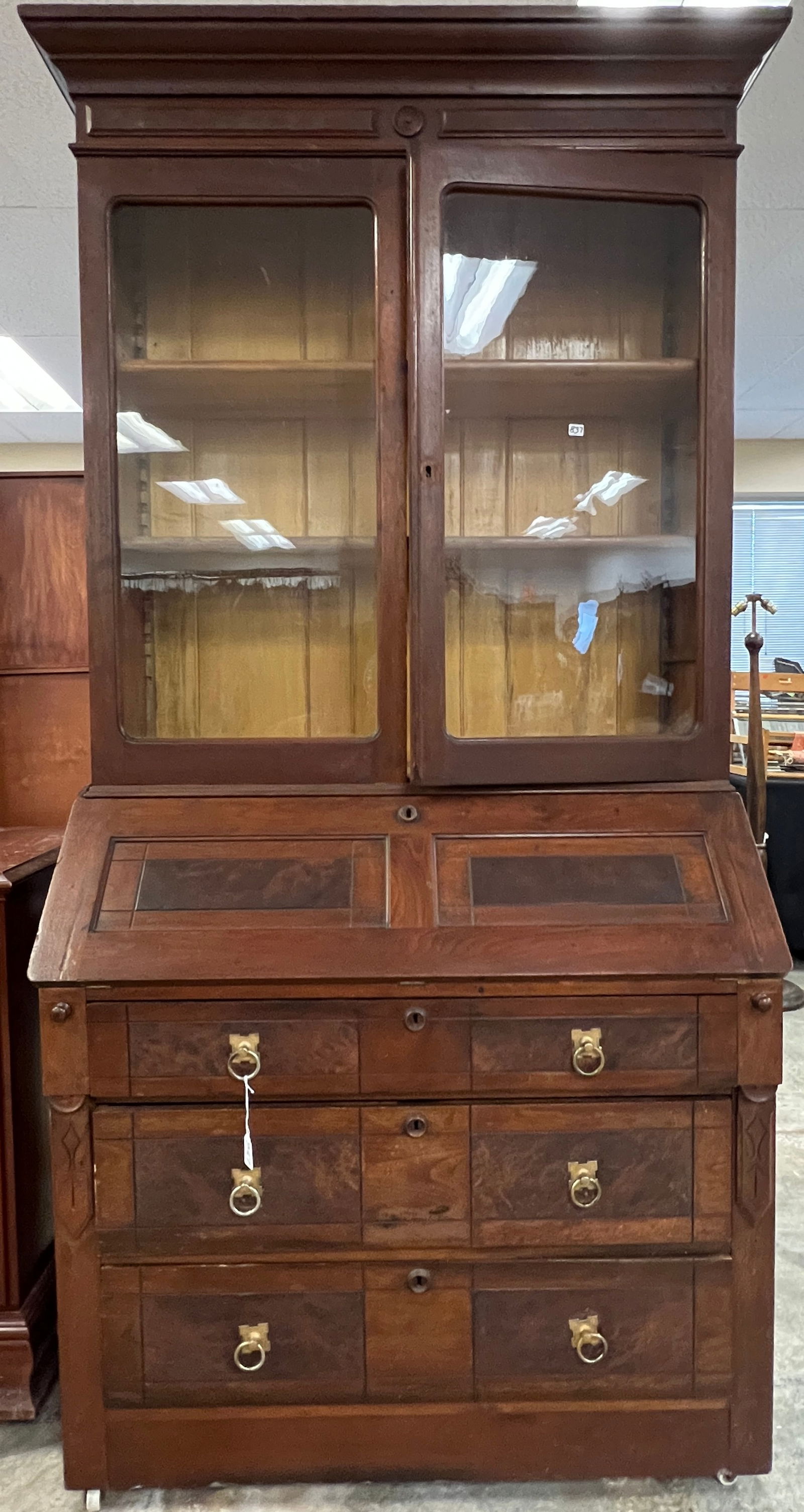 Victorian Drop Front Secretary w/ Bookcase: An antique Victorian drop front secretary with bookcase top, 3 drawer base and fitted interior. In original finish, it measures 82.5" tall X 40" across X 20" deep.