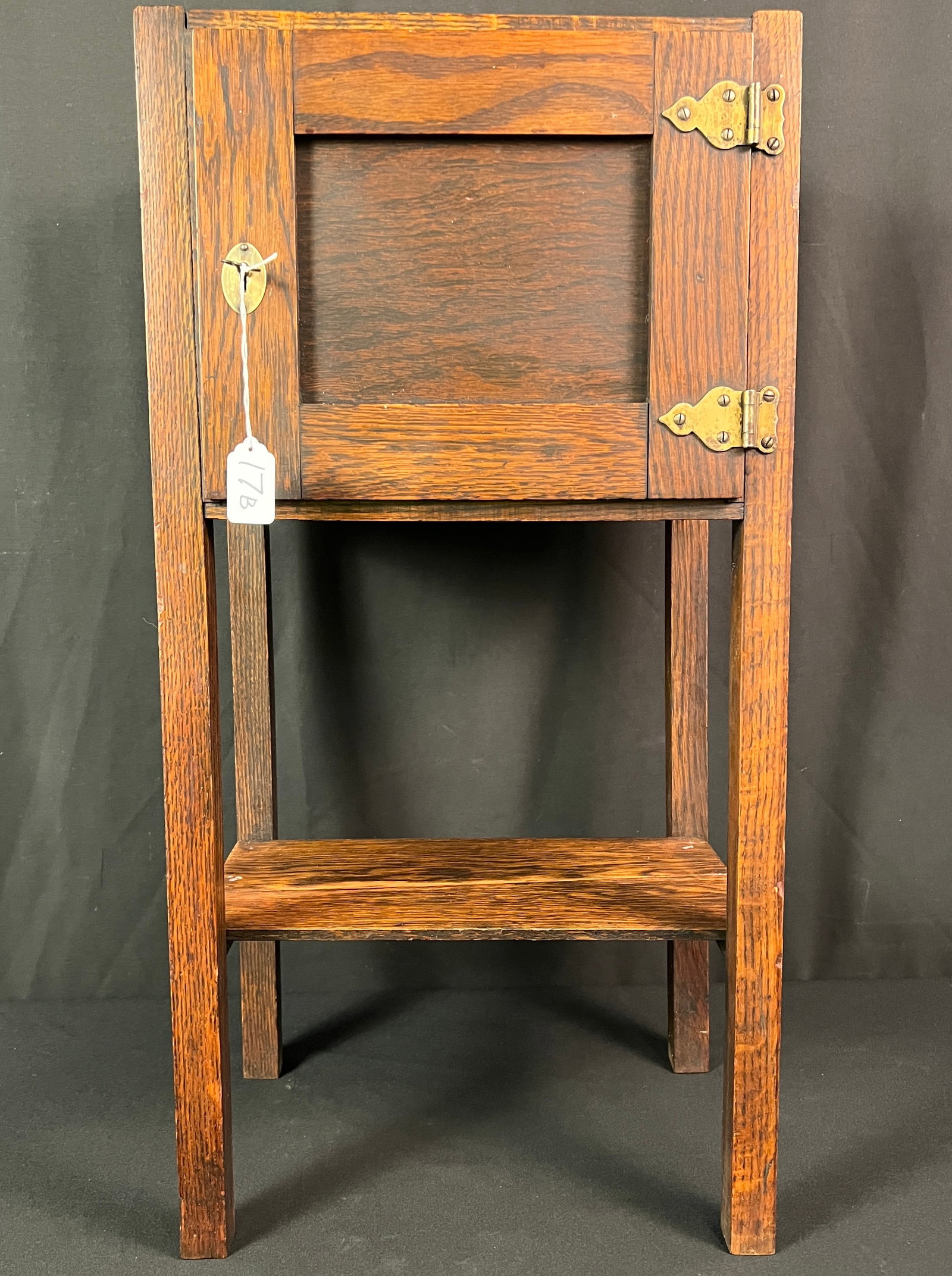 Mission Oak Humidor: An Arts & Crafts mission oak floor standing humidor with fitted interior. In fumed oak and original finish (with some losses to finish noted), it measures 27" tall X 14" across X 6.5" deep.