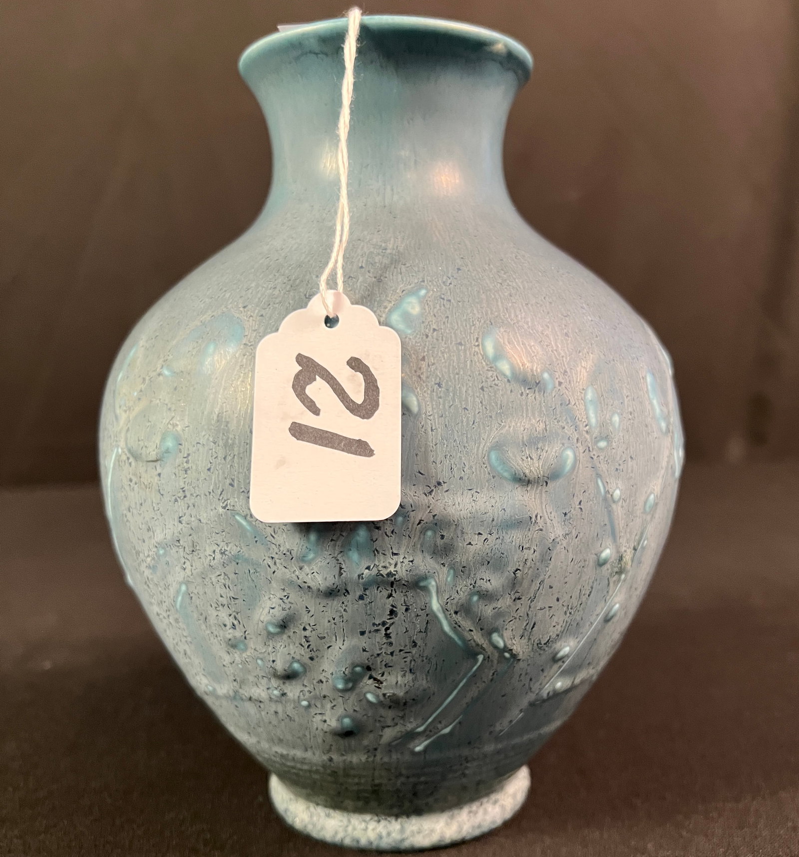 Rookwood Blue Glaze Stag Vase c. 1932: An arts & Crafts Rookwood Pottery vase with blue glaze depicting stags. Piece is signed and dated 1932 on bottom. In excellent condition, it measures 7.75" tall X 5.5".