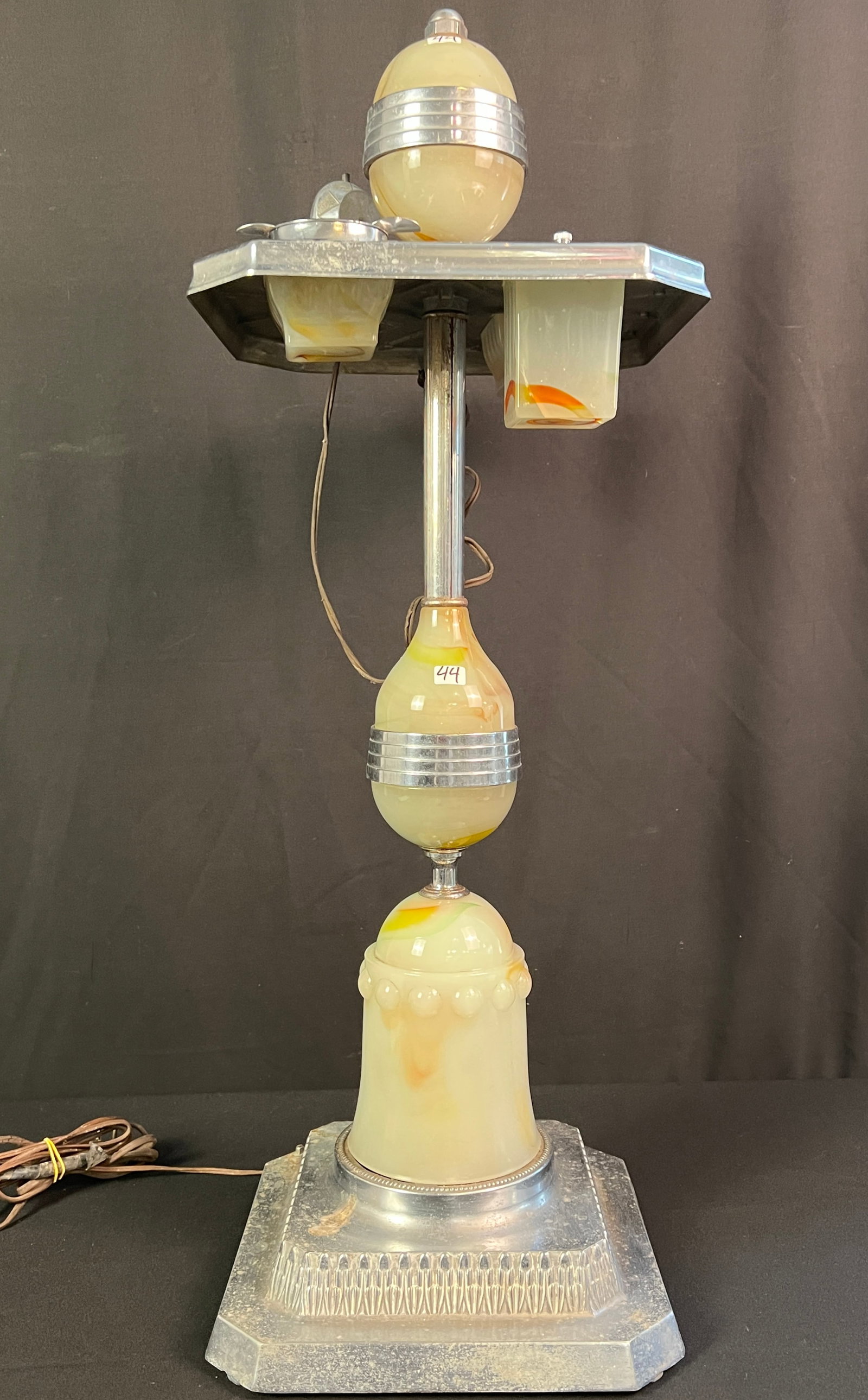 Art Deco Light Up Ashtray Stand: An Art Deco light up ashtray smoking stand. Piece is complete but needs to we rewired/requires some restoration. There is a crack in the ashtray, electric lighter needs restoration. Despite condition
