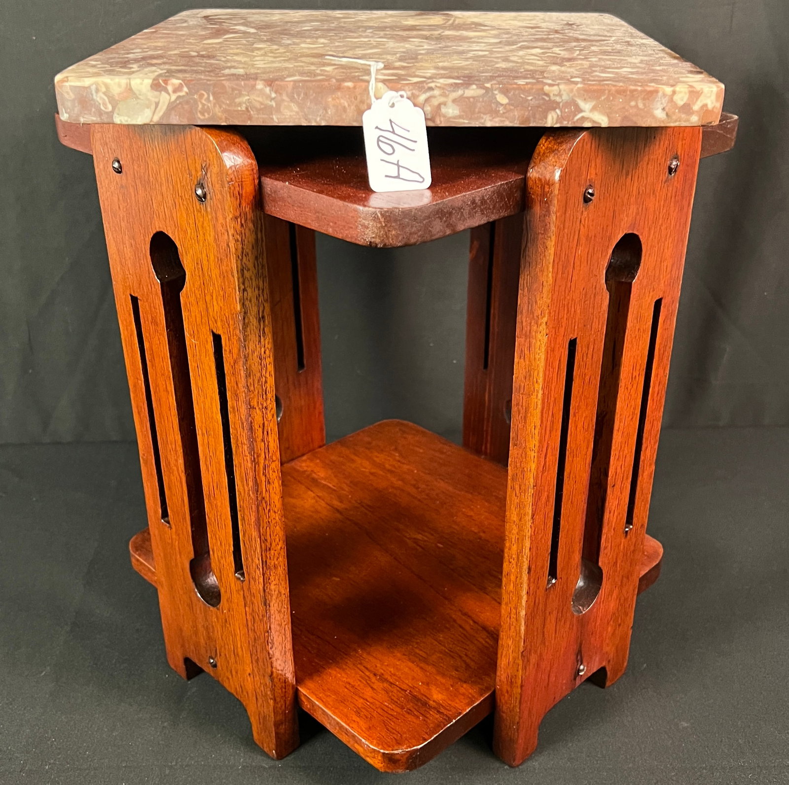 2-Tiered Art Deco Marble Top Stand: A two-tiered Art Deco marble top stand. It is house ready and in good condition, measuring 16" tall X 12" square.