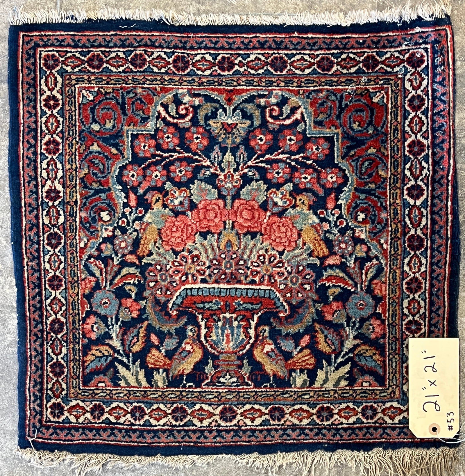 Rare Tightly Woven Antique Prayer Rug: A rare and exceptional antique prayer rug. Rug Features: Floral urn with birds in center and is surrounded by a series of geometric borders. This rug retains its original fringe and is done in blues, 