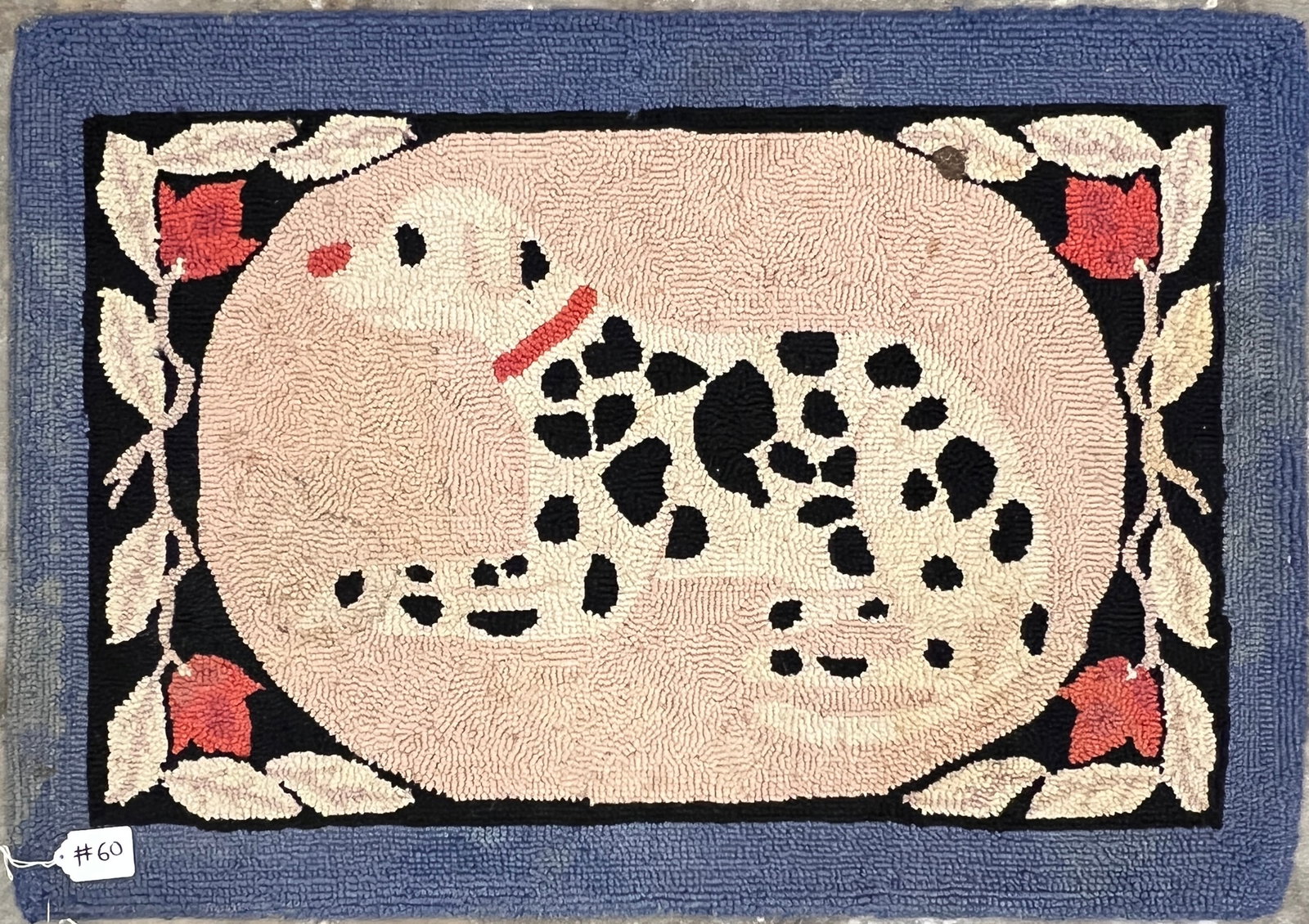 Hand Hooked Rug Depicting a Dalmatian: A hand hooked rug depicting a dalmatian. The rug is done in wool and measures 25" X 36".