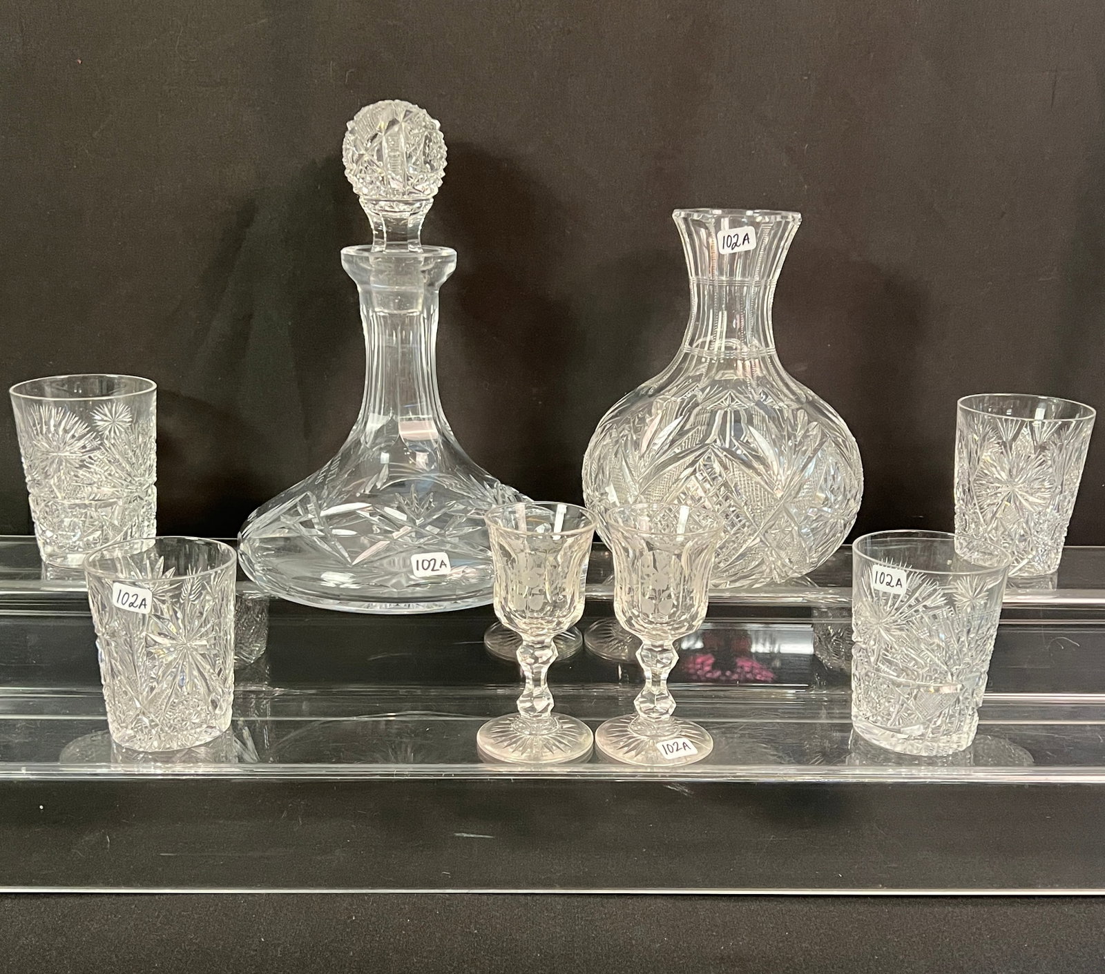Cut Crystal & Etched US Marine Corps Decanter, More: A cut crystal decanter with etching that reads "Semper Fidelis U.S. Marine Corps" and emblem (11" tall X 7.5" round), 4 brilliant cut crystal goblets with a small chip on rim of one glass (different h