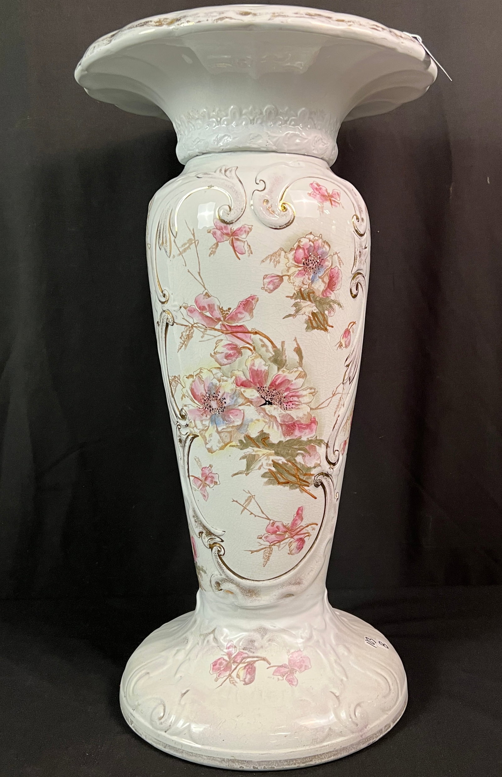 Porcelain Plant Pedestal: A hand painted porcelain plant pedestal, trimmed in gold and attributed to Bond, Germany. In excellent condition, it measures 23" tall X 13" round.