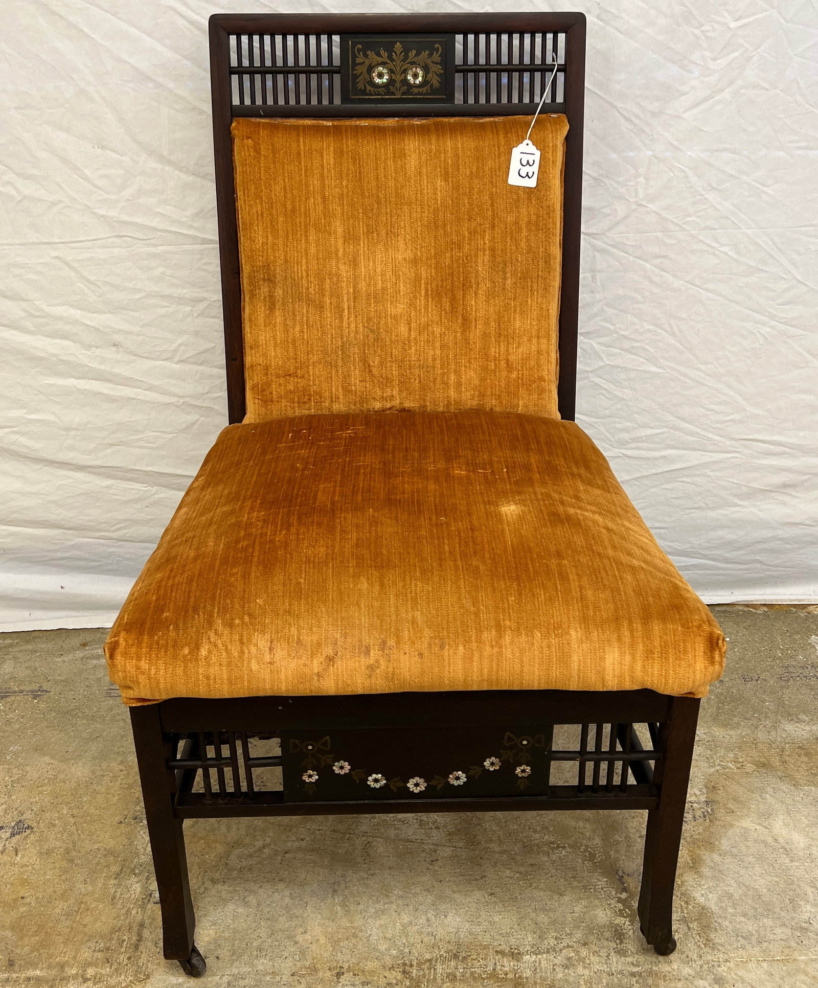 Aesthetic Movement MOP and Brass Inlaid Chair c.1880: An aesthetic movement chair c. 1880s featuring elaborate inlay mother of pearl floral inlay accompanied by brass inlay. This piece was likely made in New York City, possibly attributed to Herter Broth