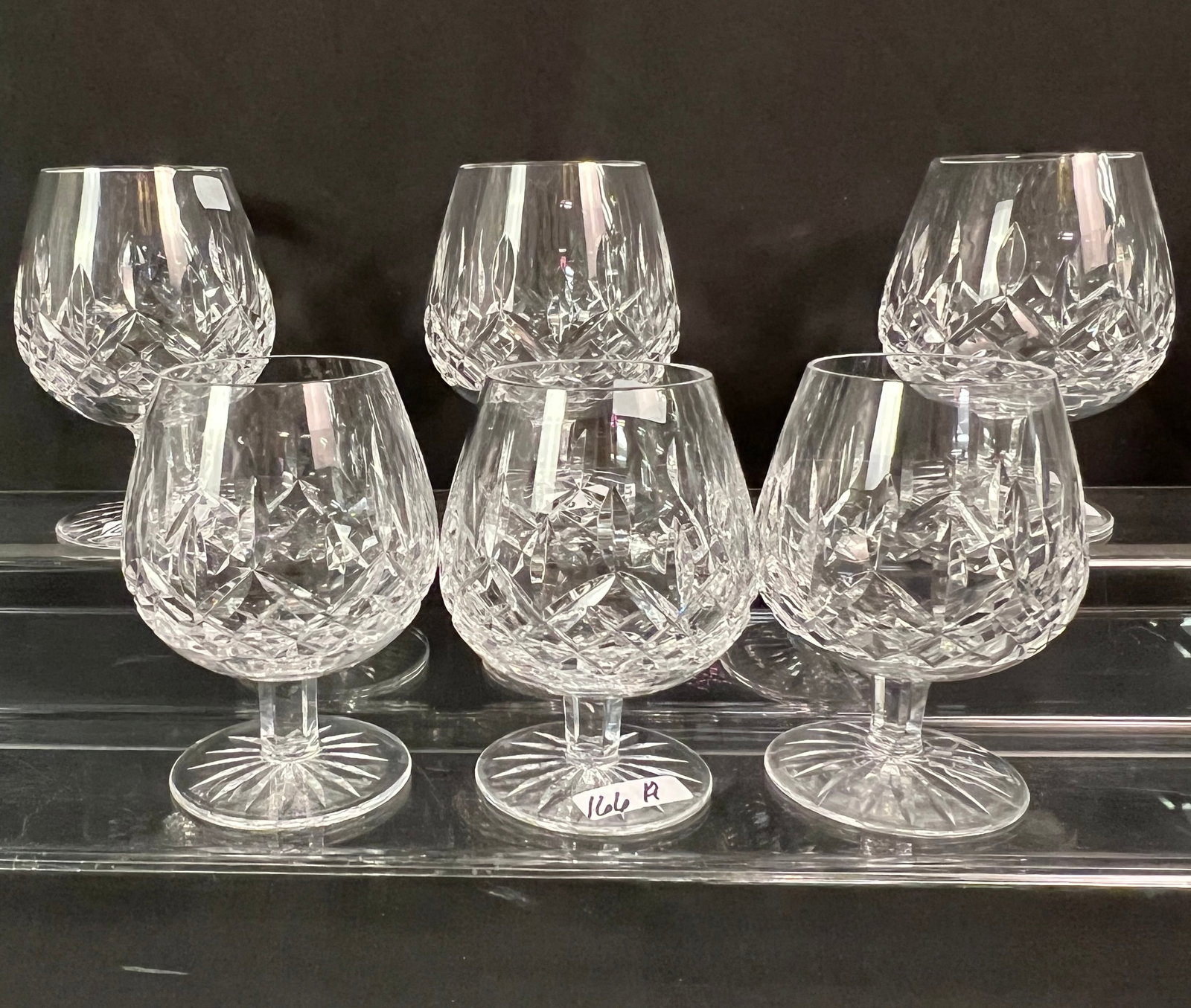 6 Waterford Snifters in the "Lismore" Pattern: A set of 6 Waterford snifters in the "Lismore" pattern. All in excellent condition and measure 5.25" tall.