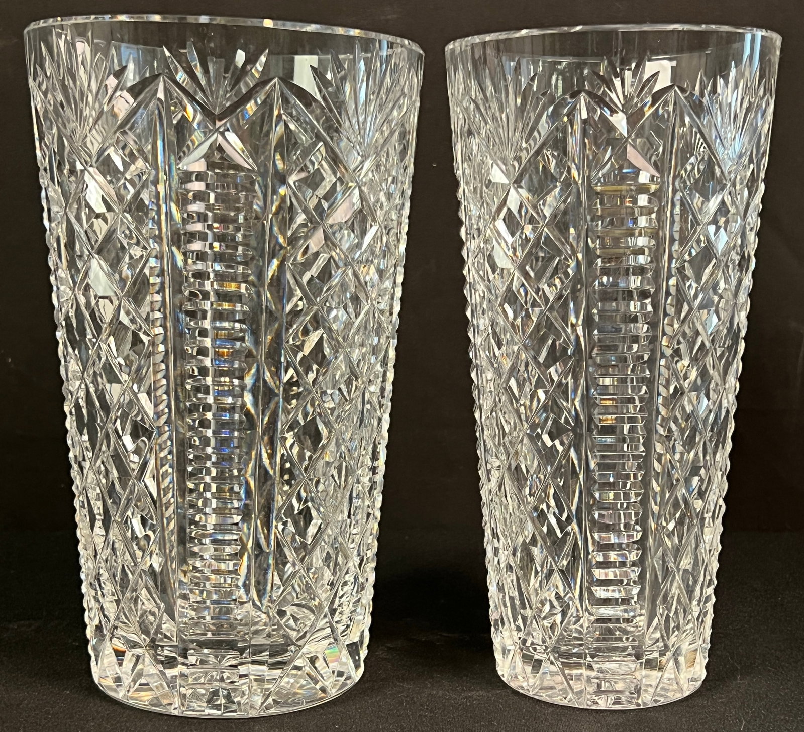 2 Large Waterford Crystal Vases: A pair of 2 large Waterford crystal vases, both in the Crystal Clare pattern featuring crisp crisscross pineapple sky shell cut style. In excellent condition, one measures 8" tall X 4" across and the