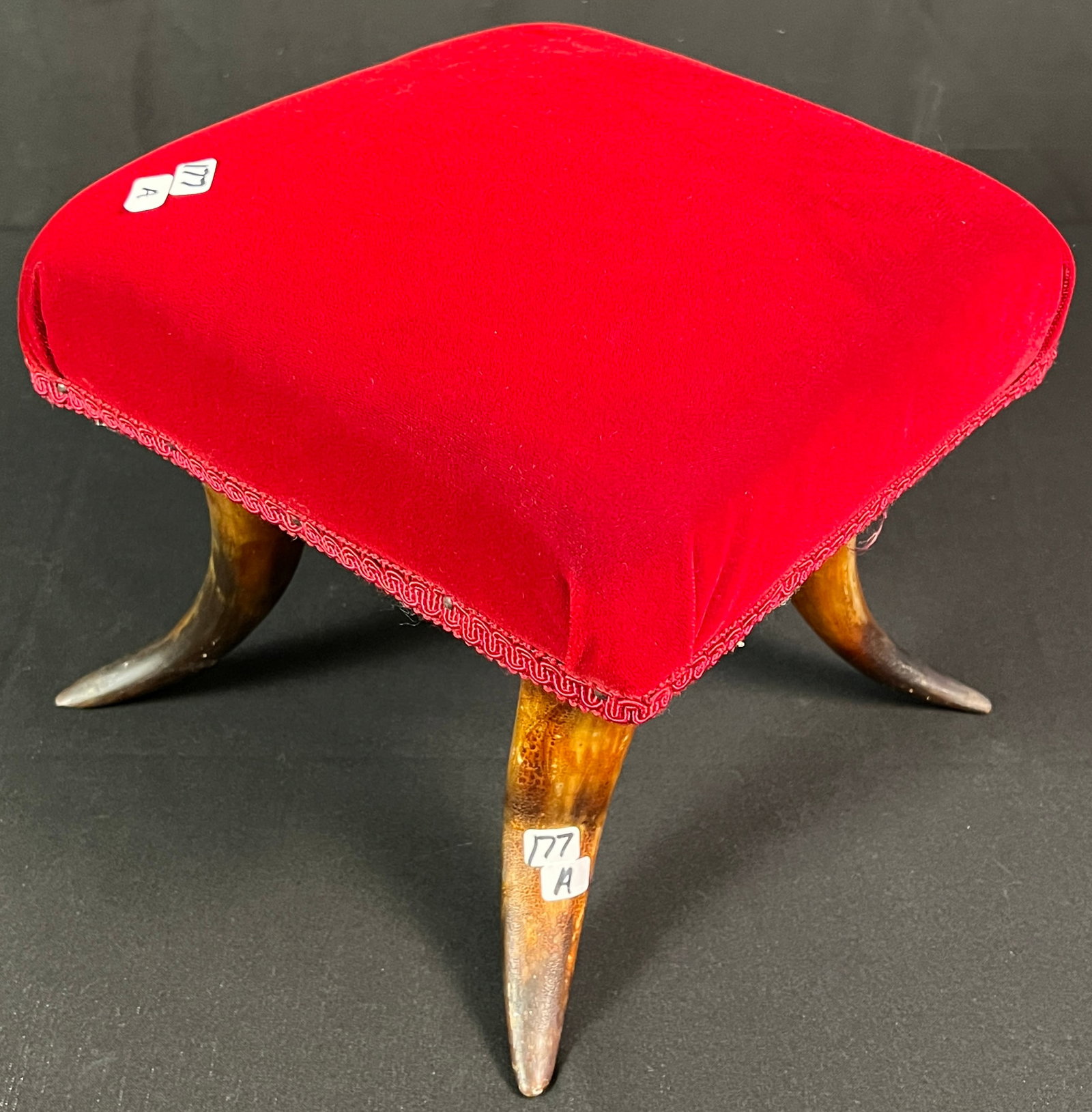 Steer Horn Stool: A turn of the century steer horn stool, newly upholstered in excellent condition. It measures 9.5" tall X 10" square.