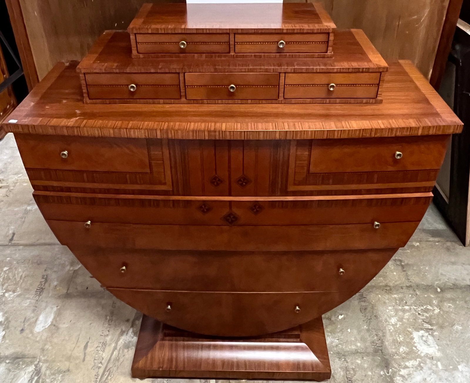 Carpanelli Briarwood Art Nouveau Inlaid Mirror: A half oval shaped Carpanelli beveled mirror with inlaid mother of pearl and string inlay frame in in excellent condition.