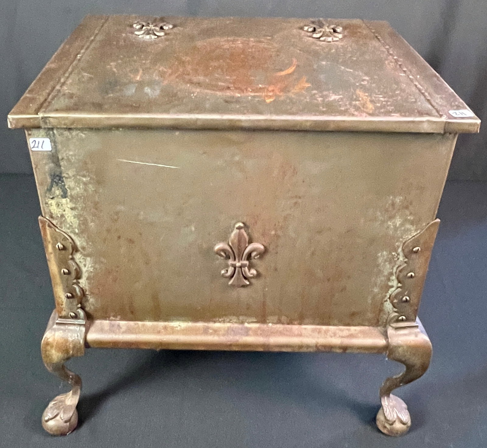 Victorian Fancy Metal Ice Cooler with Fleur De Lis Accents: An elaborate Victorian ice cooler with removable liner, fleur de lis accents, handles on sides and claw ball feet. A very unique piece, it measures 17.5" tall X 20" across X 14.5" deep.