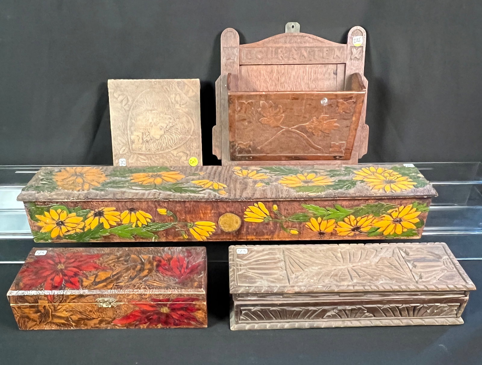 Group of Folk Art Boxes, Pyrography, More!: 4 antique Folk art boxes to include a large floral carved and painted box with 3 compartments (4" tall X 30" across X 5" deep), a pyrographic lidded box with painted poinsettias, 3.5" tall X 12.5" acr
