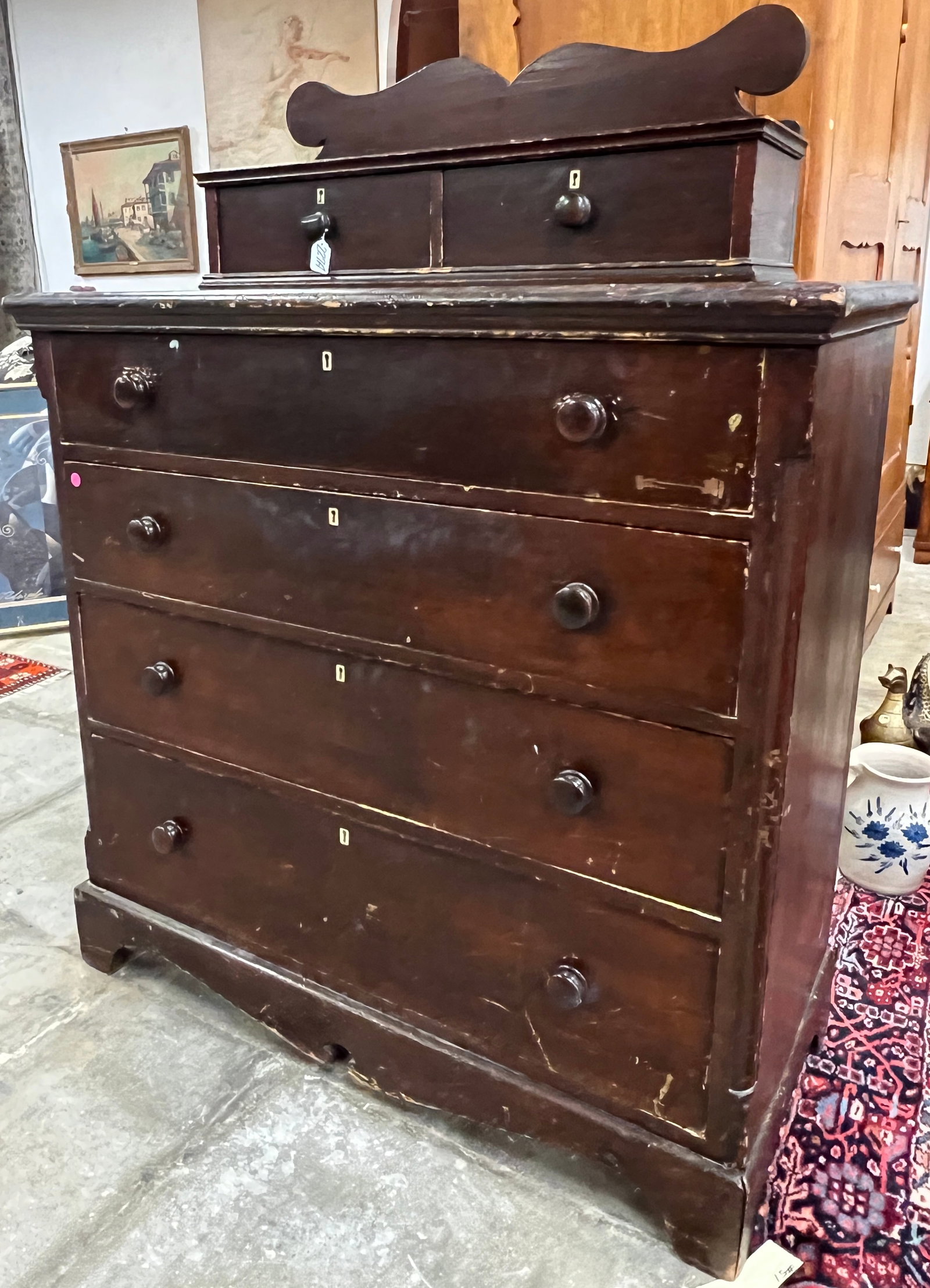 Early New England 4 Drawer Chest: An early New England (1800-1820s) 4 drawer chest with removable double drawer hanky box top with fancy backsplash. This chest sits upon a pre-dove tailed, scalloped and block-footed base. It appears
