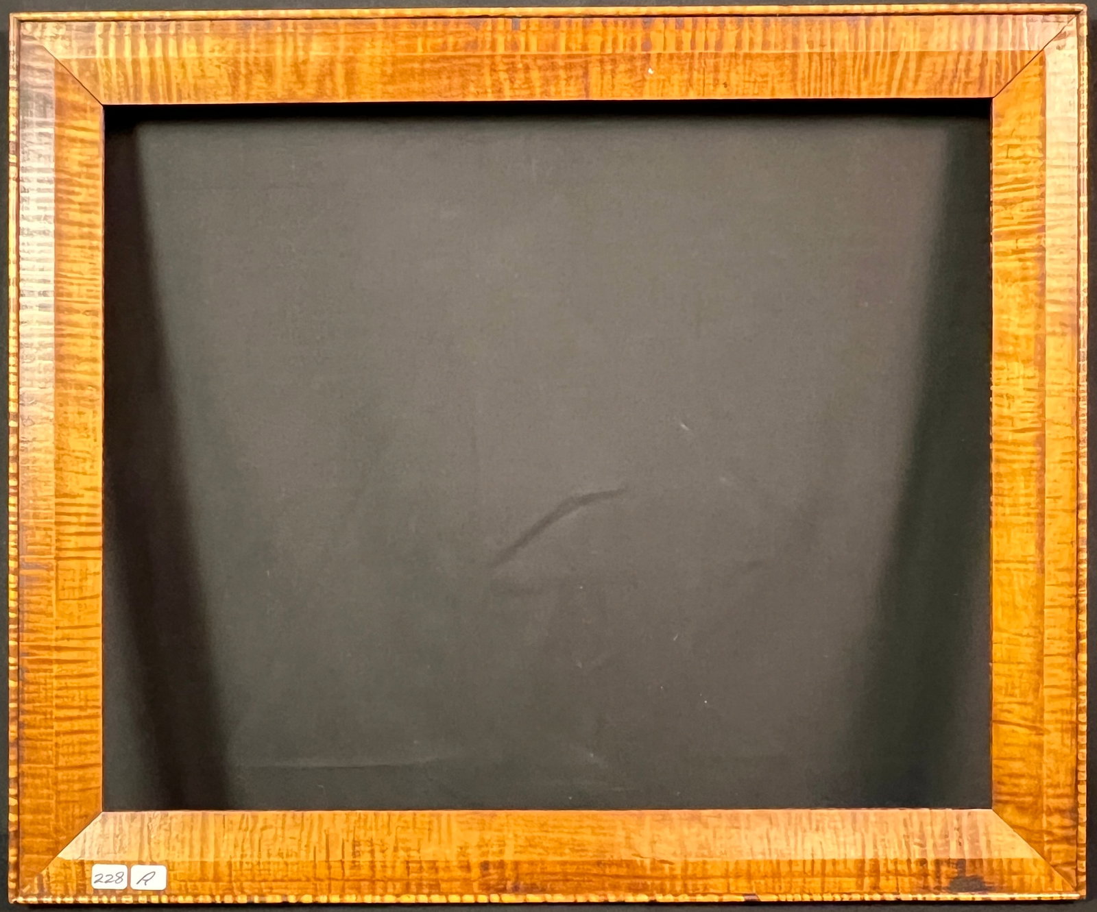 Tiger Maple Frame: A quality tiger maple frame that measures 19" tall X 23" across on the outside and the inside measures 15.5" tall X 19.25" across. In excellent condition.
