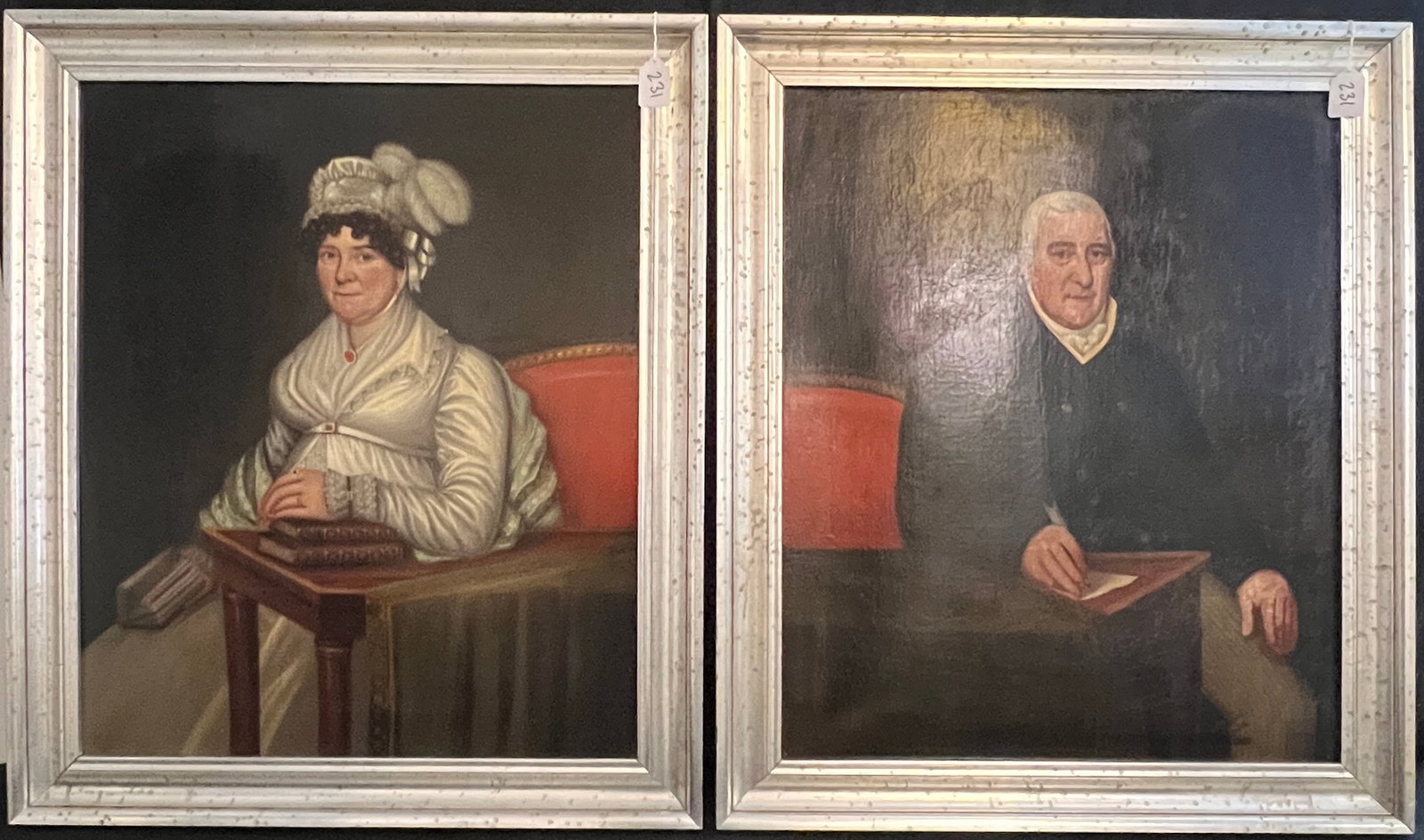 Pair Of Oil on Canvas Portraits C 1830's: A pair of quality framed oil on canvas portraits laid down on board depicting a husband and wife of wealth. The lady pearl and semi-precious jewelry, feathered hat and lace cuffs and dress details.