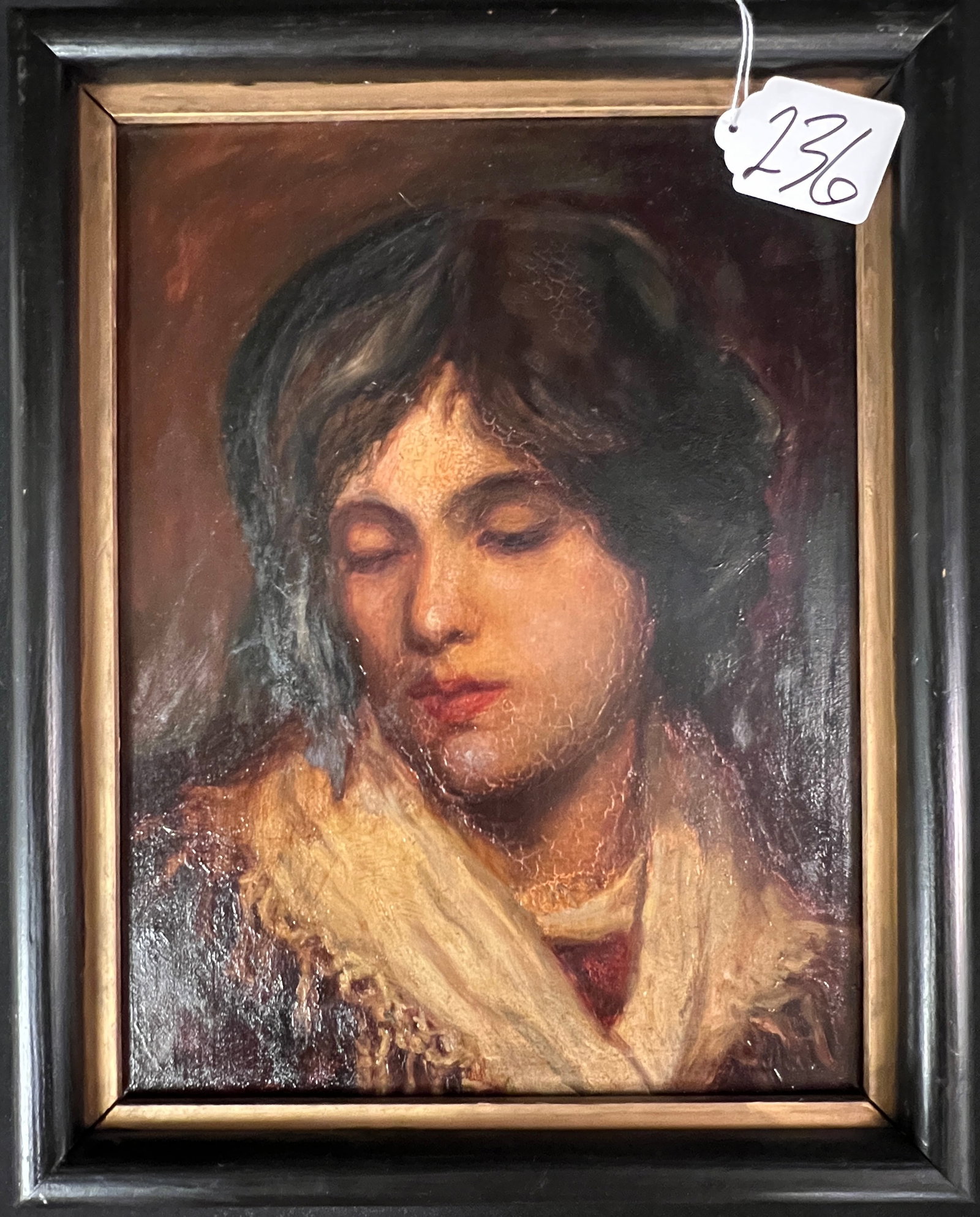 Early Portrait of a Young Maiden: An early portrait of a young maiden painted on board, with German writing on the back describing her as an Italian fisher girl. In excellent condition, it measures 14" tall X 11" across framed.