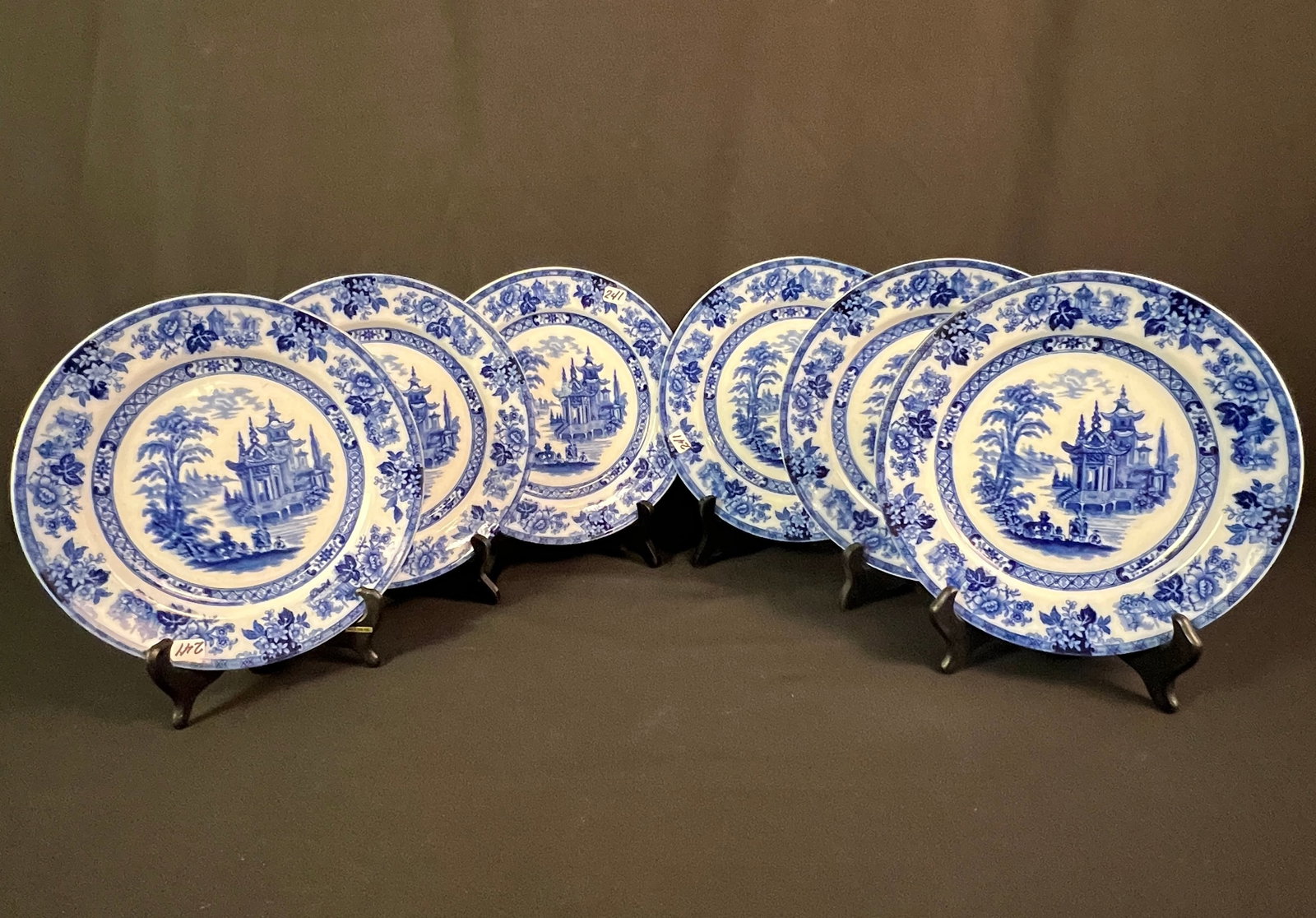 Flow Blue Doulton Burslem Plates: 6 Doulton Burslem plates in the Madras flow blue pattern, made in England. They measure 9.5" round, all in excellent condition.