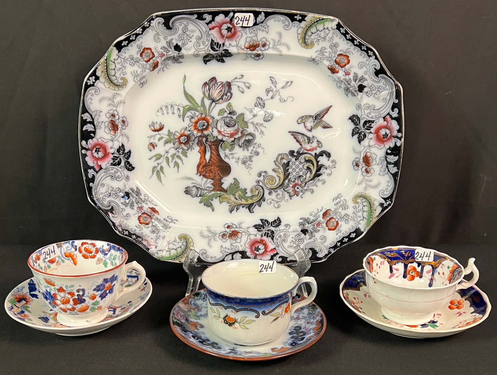 Flow Blue Gaudy Welsh Platter and Cups w/ Saucers: A flow blue Gaudy Welsh platter in the Phantasia pattern (1.75" tall X 13.5" long X 10" across) along with 3 Gaudy Welsh flow blue cups and saucers. All in good condition, no knife marks, chips or