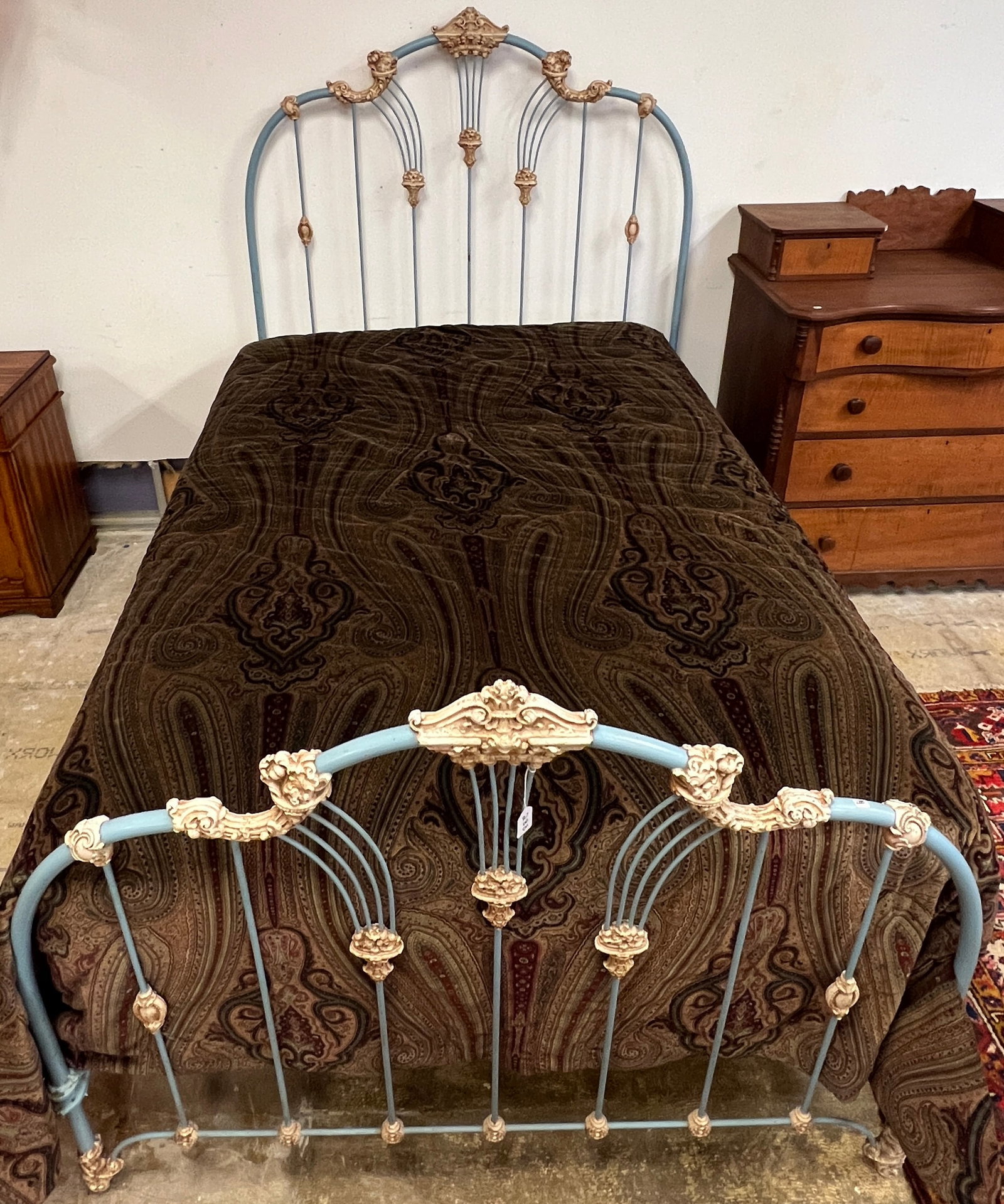 Fancy Cast Iron Bed c1900: A turn of the century cast iron bed with box spring and mattress. Frame is painted and in excellent condition, it measures 68" tall X 53" across X 81" long.